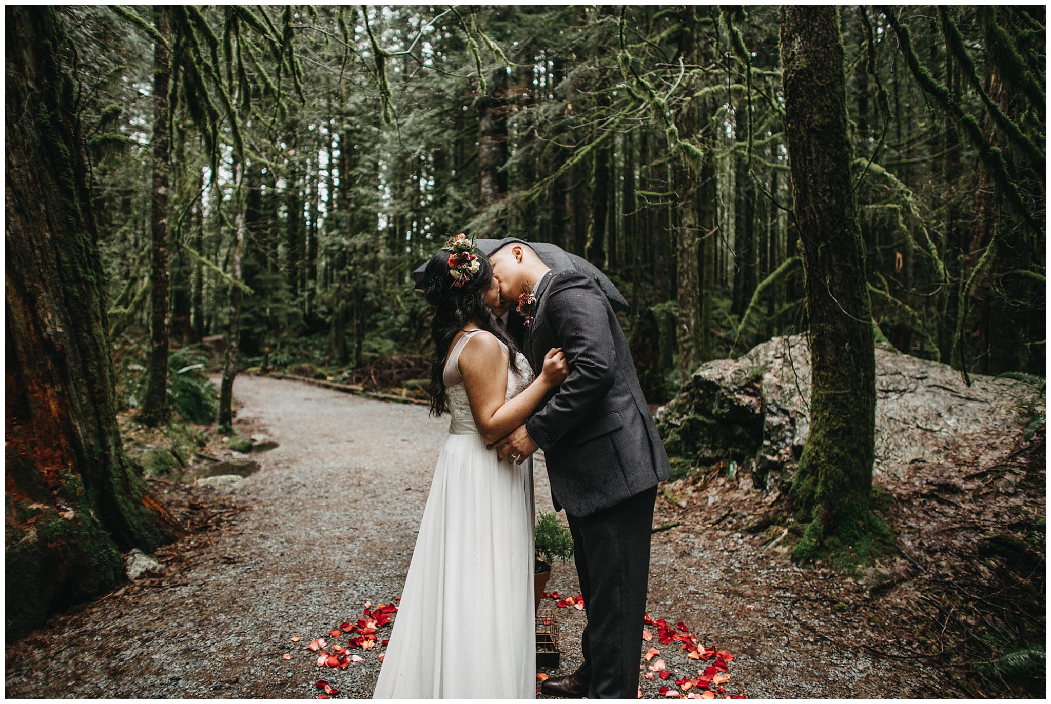 wedding couple kiss ceremony bride groom intimate forest golden ears wedding