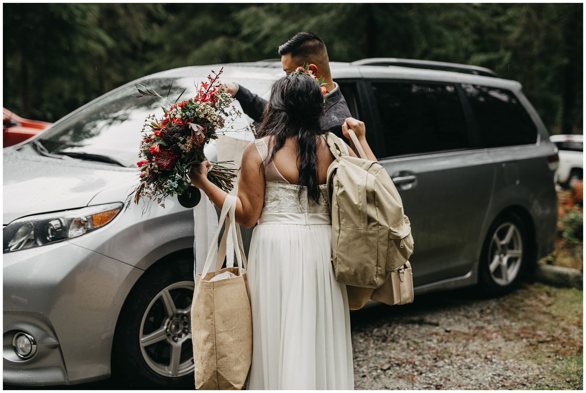 laid back bride carrying own bags at wedding forest intimate ceremony golden ears