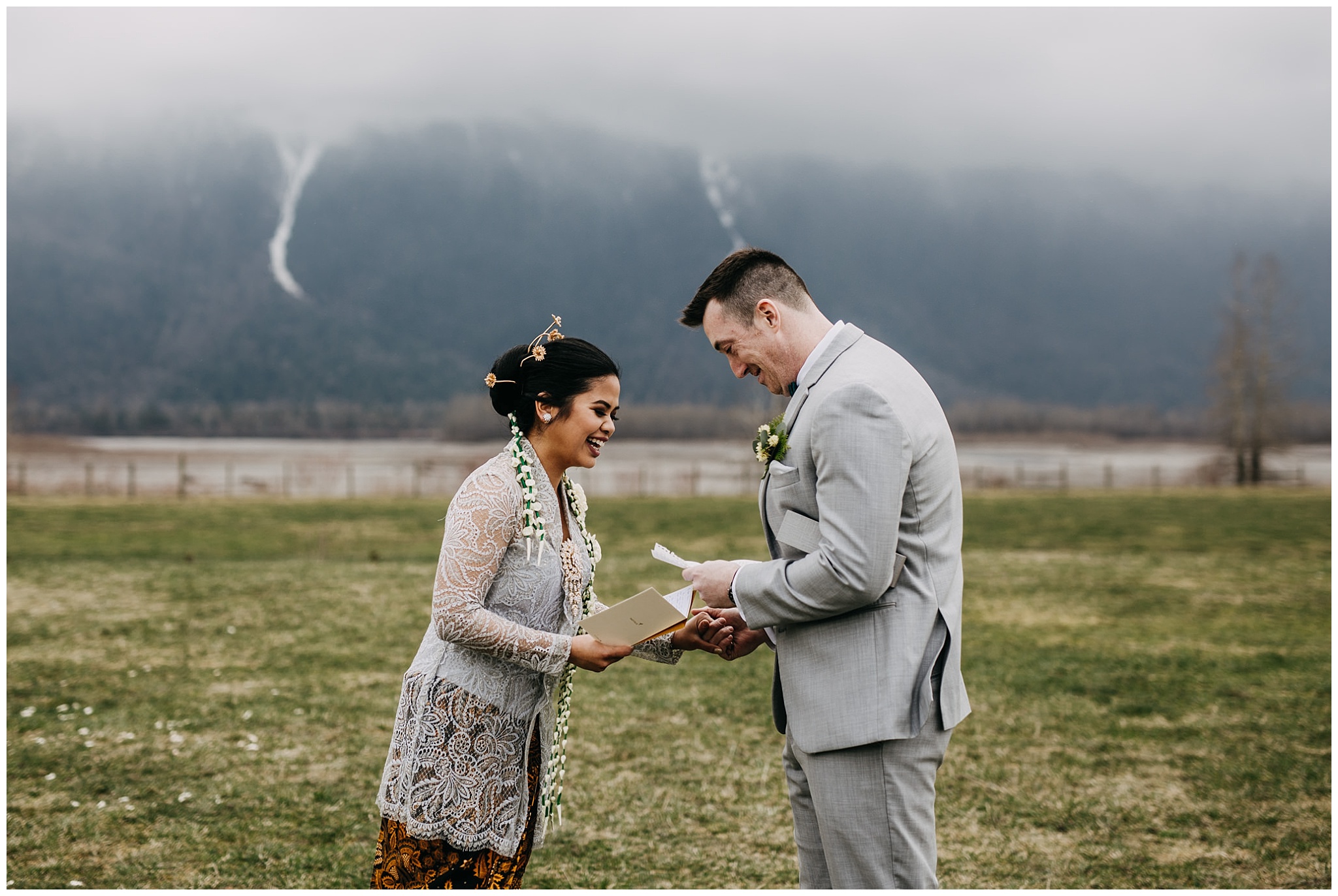 bride and groom reading letters at first look at fraser river lodge wedding