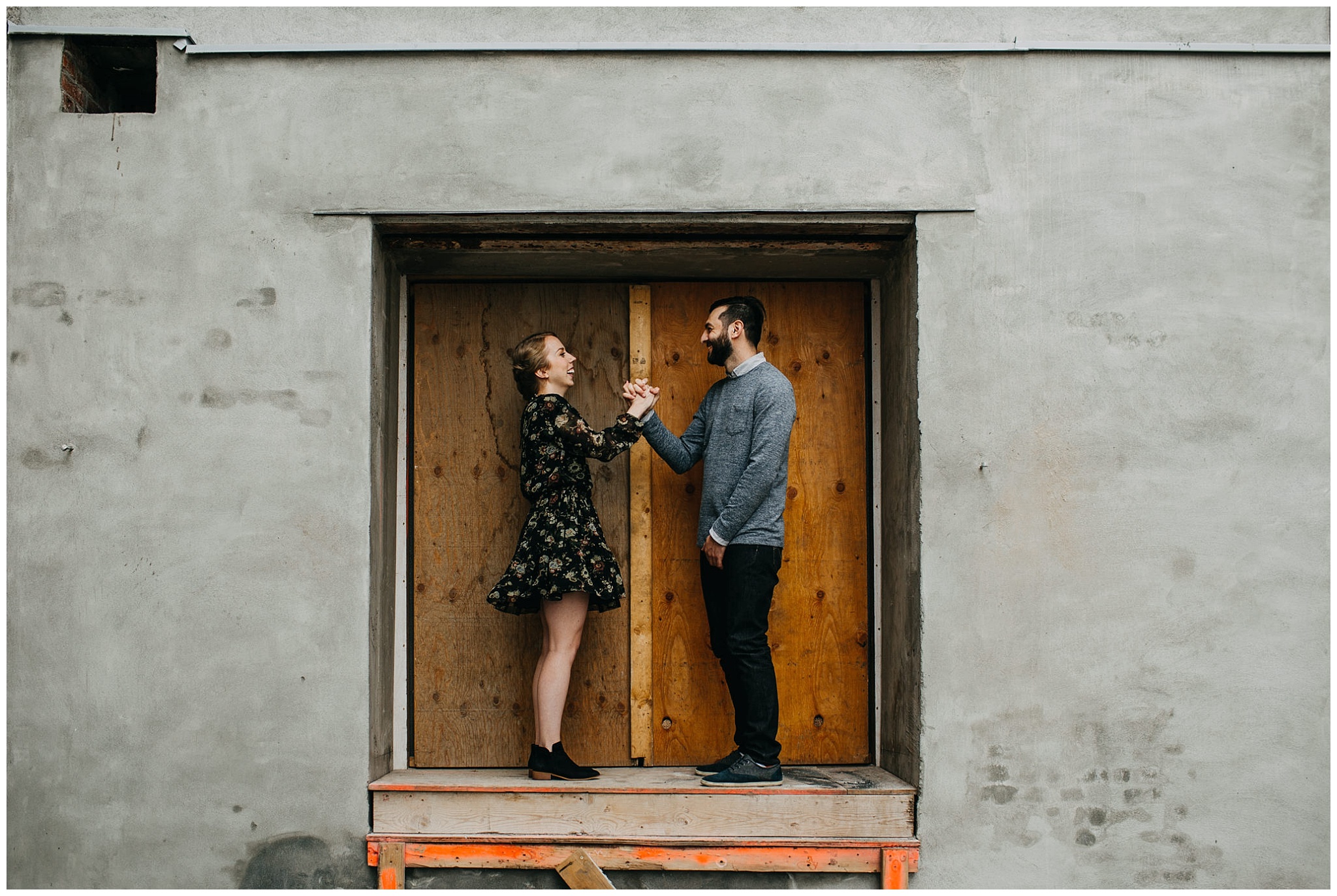 artistic couple photo at urban downtown new west engagement session