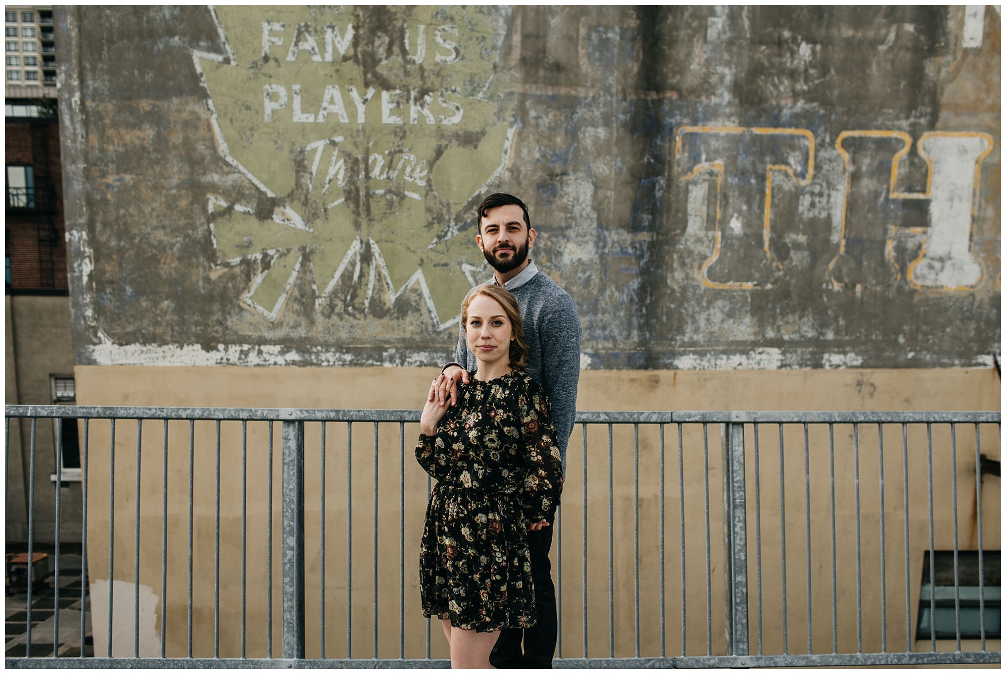 couple on rooftop parkade at downtown new west engagement session