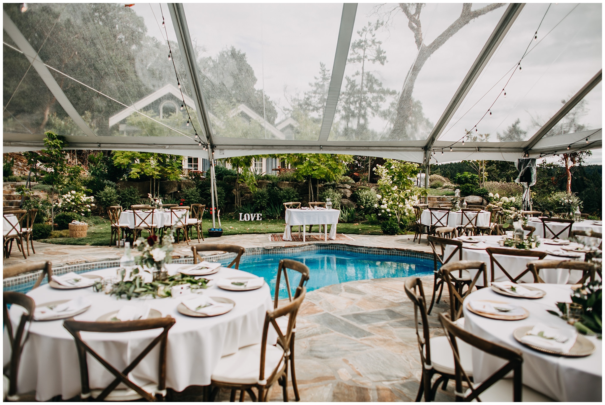 intimate mayne island backyard wedding reception decor by pool