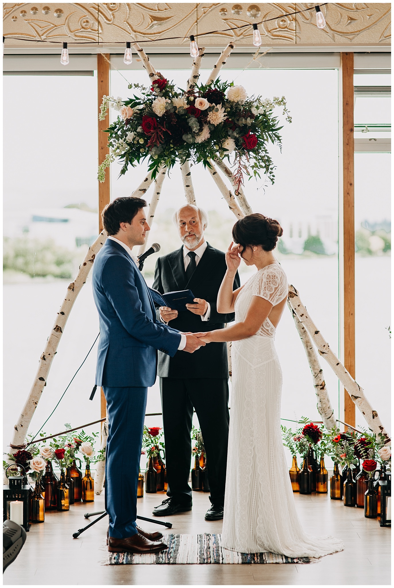bride and groom emotional moment at ubc boathouse wedding ceremony 