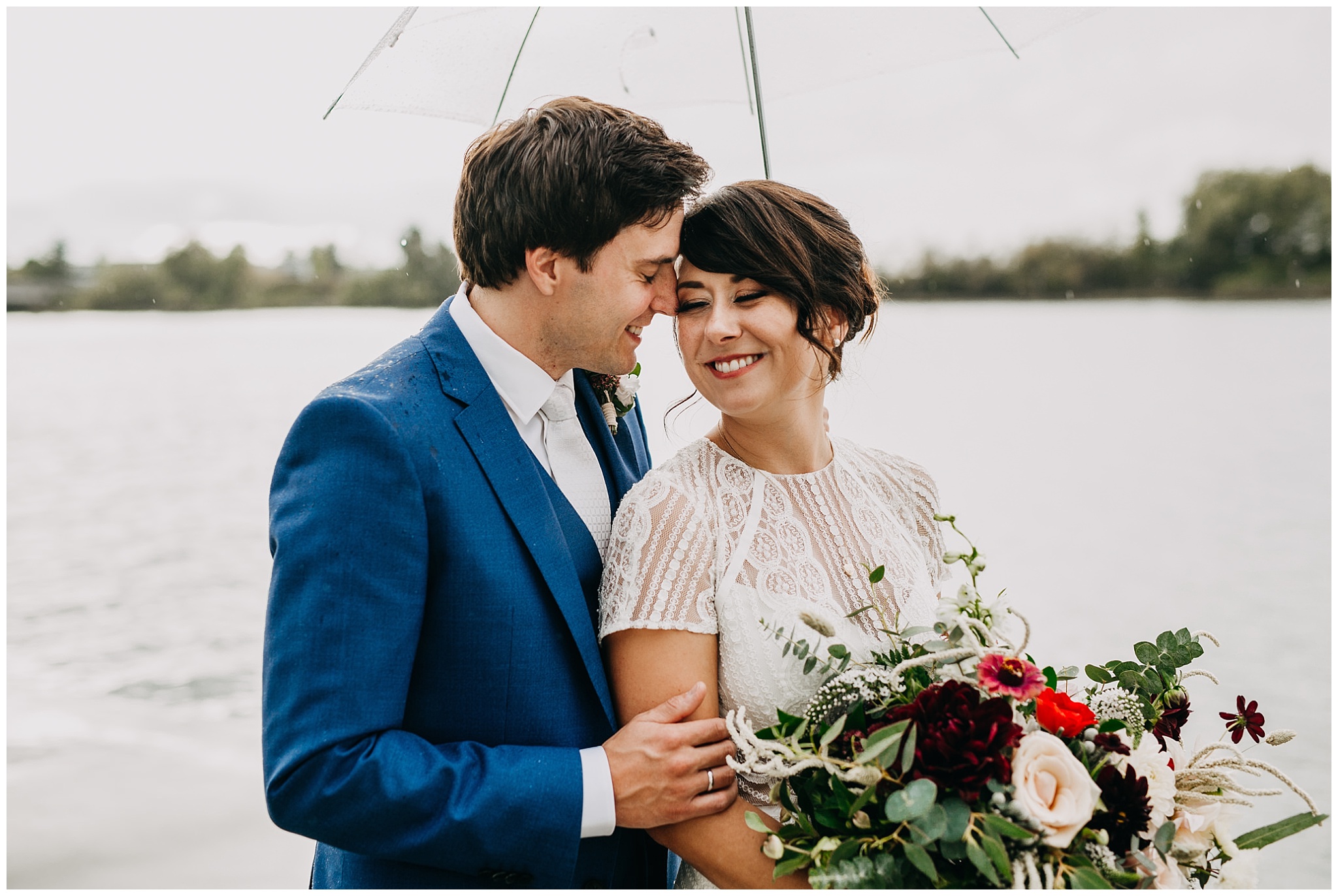 bride and groom portrait in the pnw rain at ubc boathouse wedding