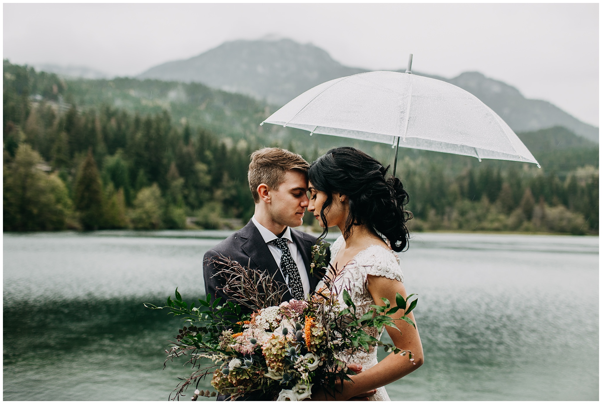 bride and groom rainy portrait at nita lake lodge elopement