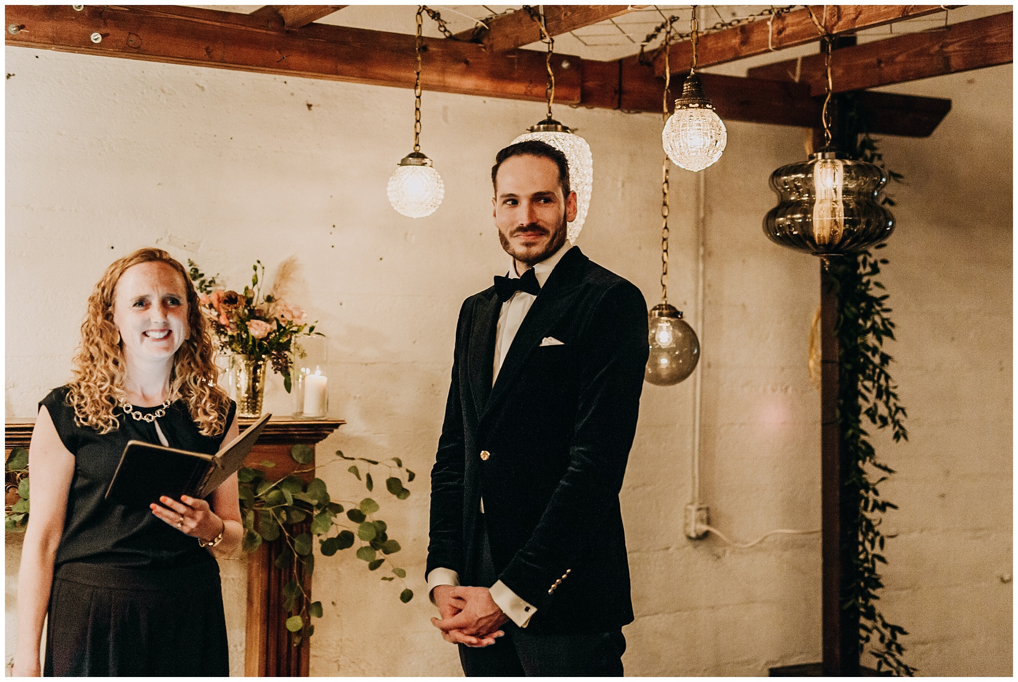 groom's reaction to bride at settlement building wedding ceremony