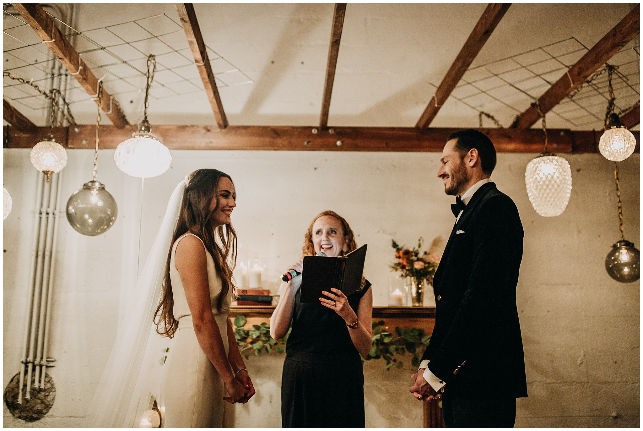 bride and groom at new years eve settlement building wedding