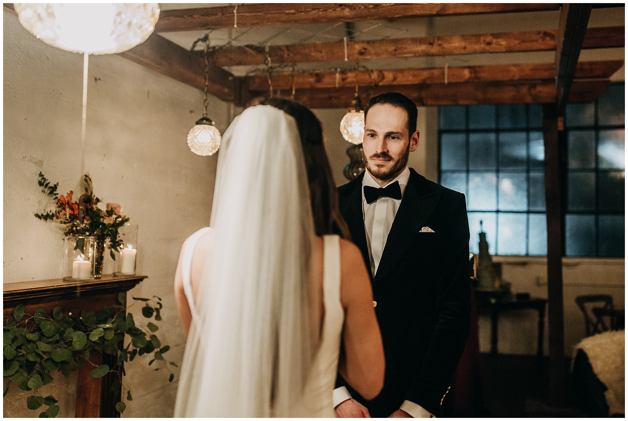 groom's reaction during vow exchange at settlement building wedding