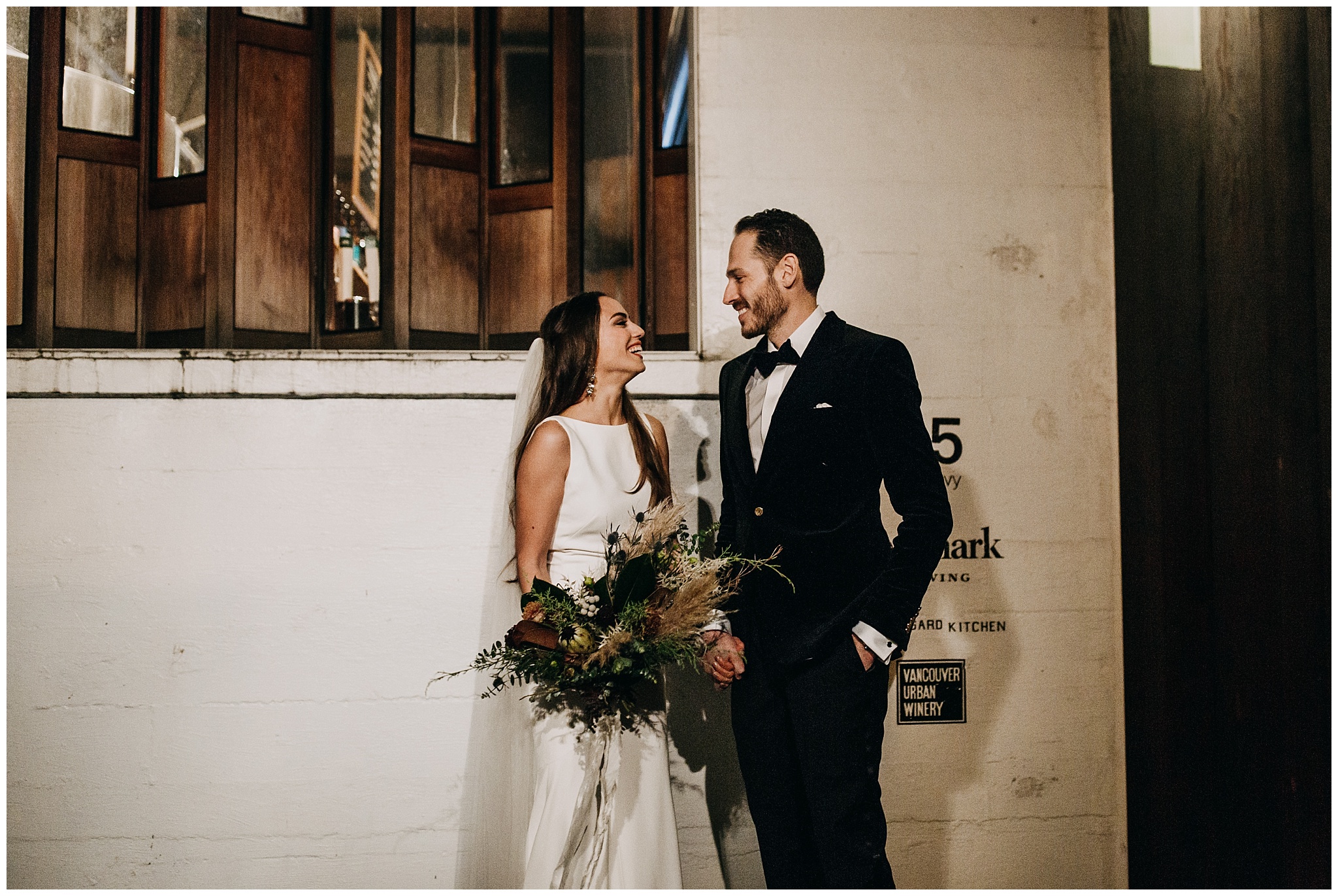 bride and groom portrait outside Postmark Brewing Vancouver