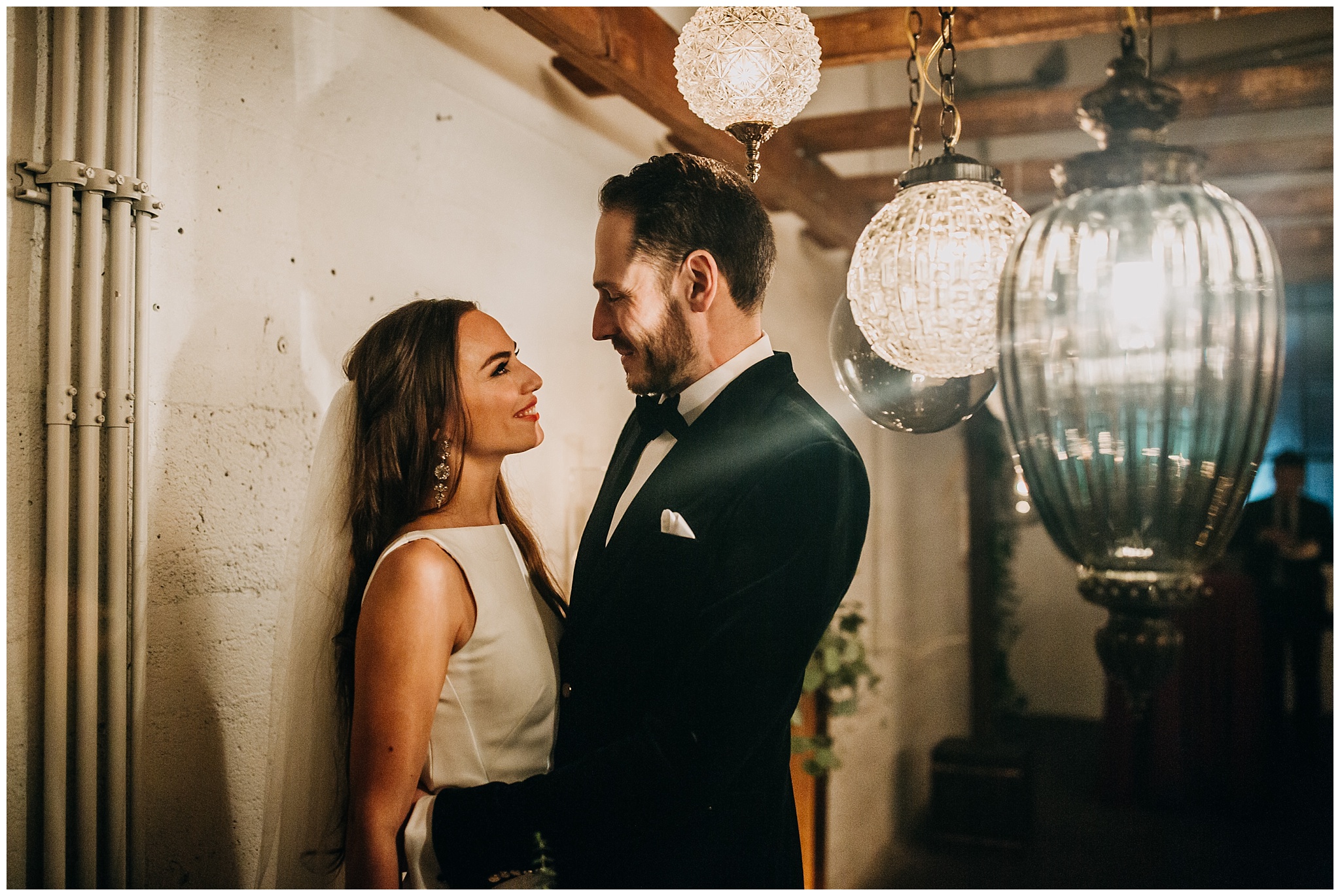 bride and groom indoor portrait at settlement building wedding