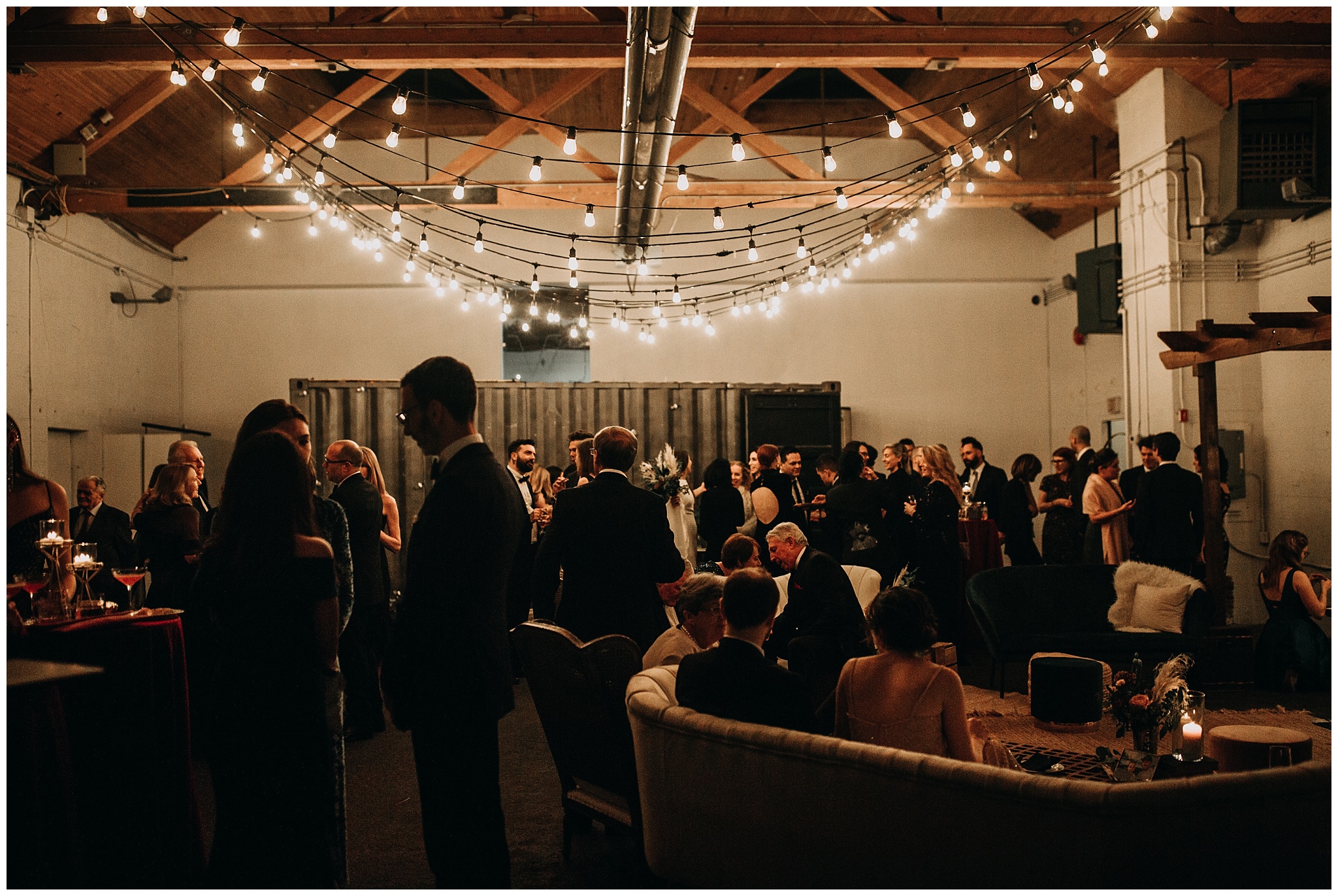 guests mingling at new years eve settlement building wedding