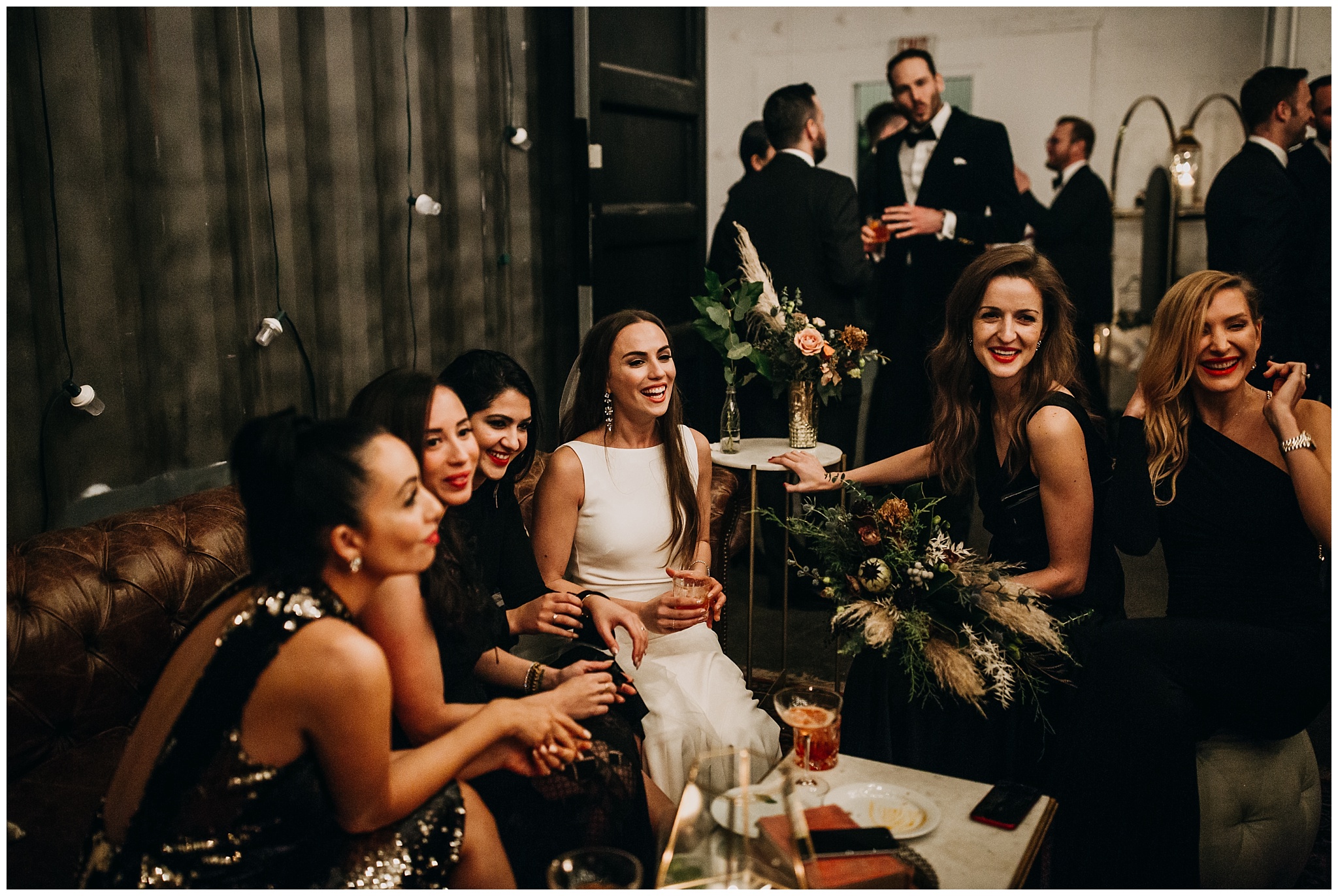 bride with girlfriends at new years eve settlement building wedding