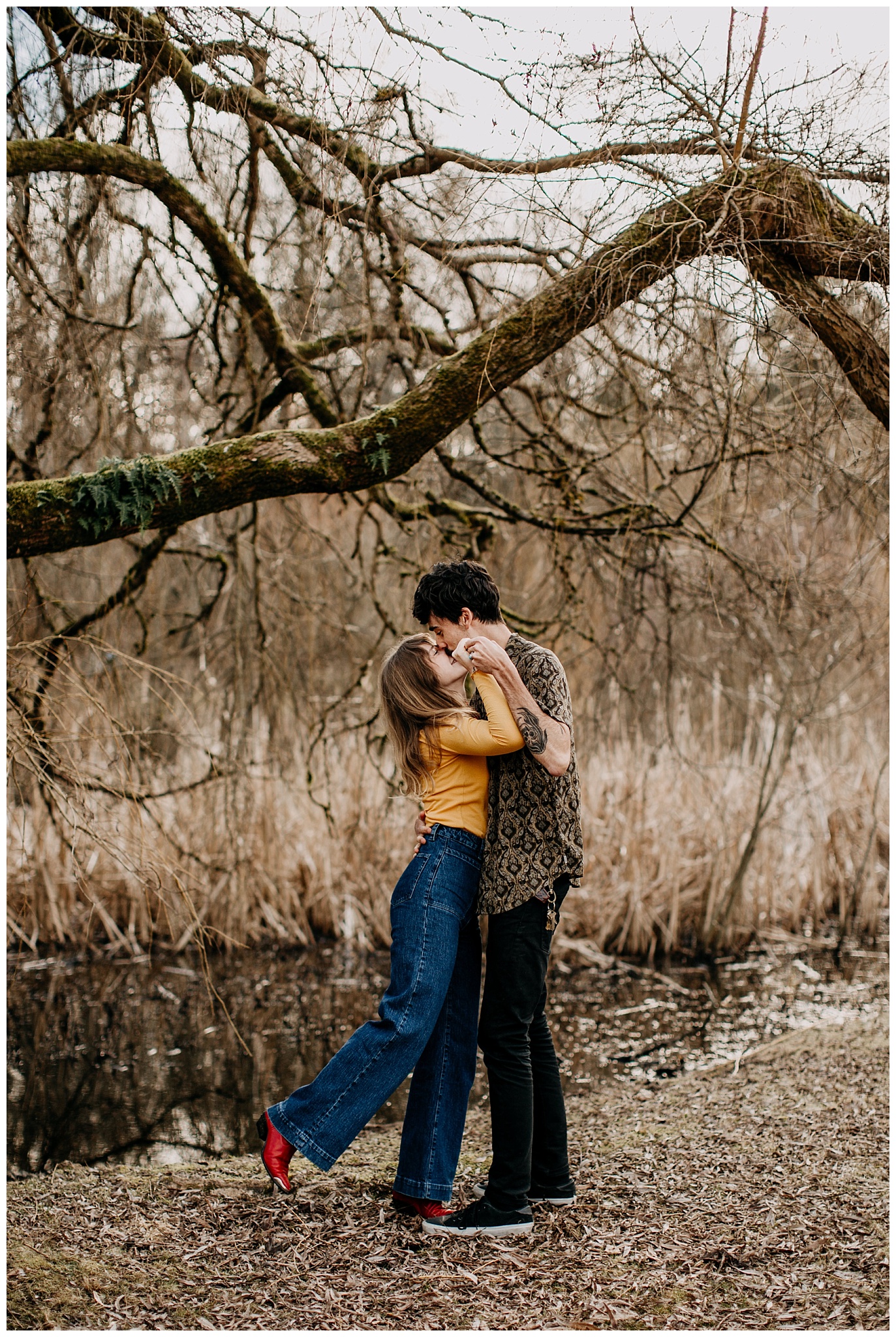 couple dancing at 70s inspired engagement session at jericho beach