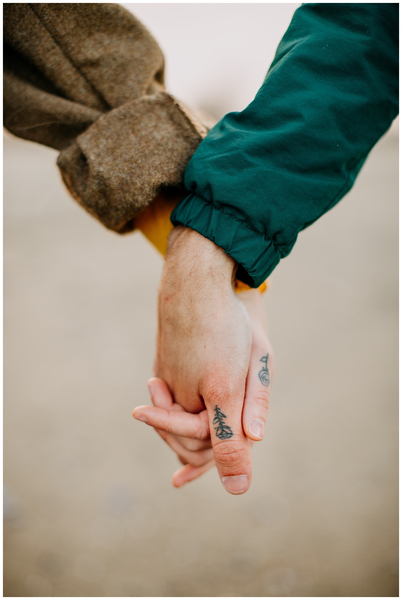 matching couple tattoo hands portrait at jericho beach engagement session