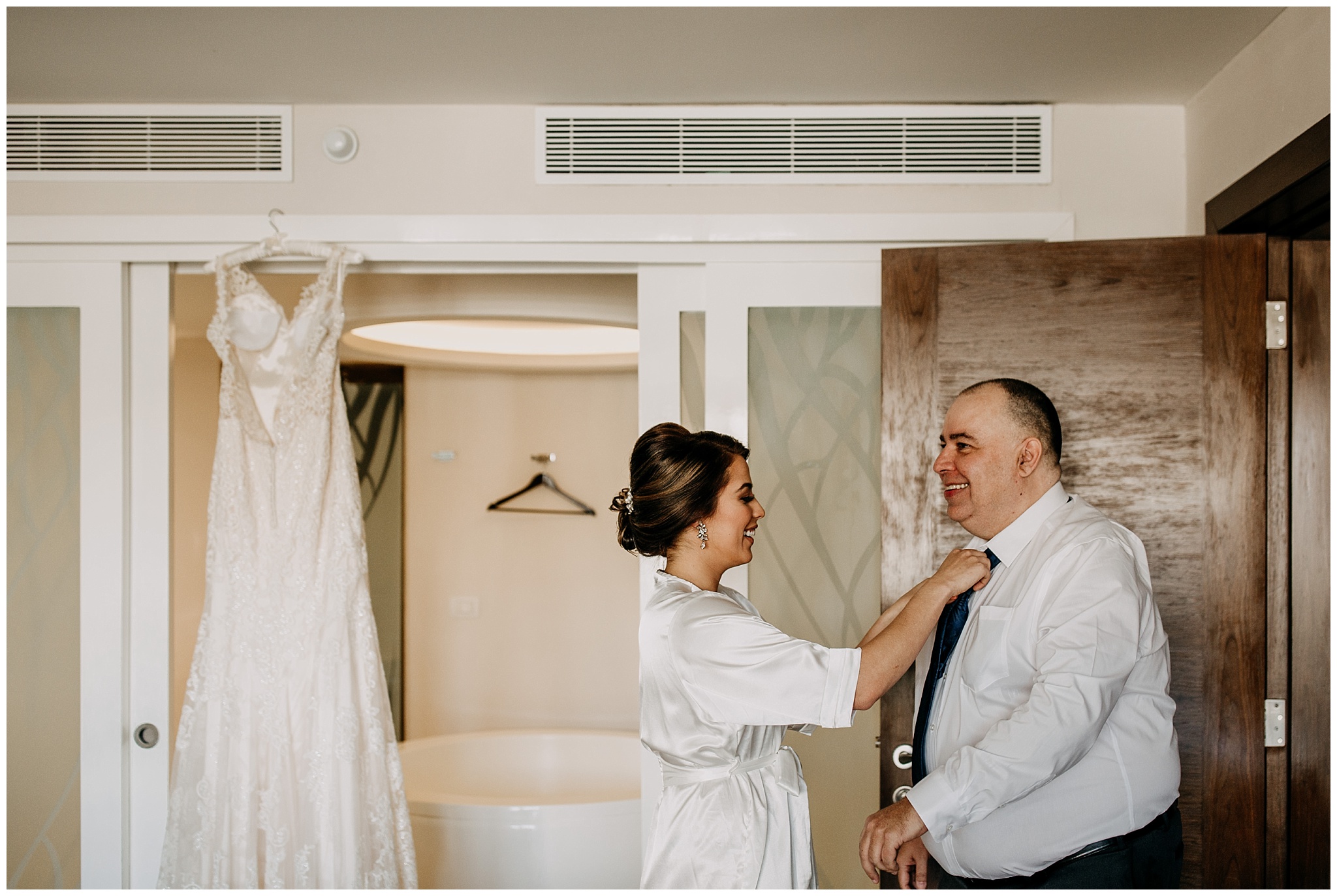bride and father getting ready at royalton riviera cancun mexico wedding