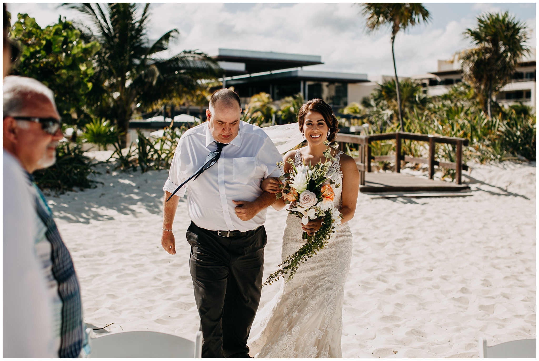 bride walking down aisle at cancun mexico beach wedding ceremony