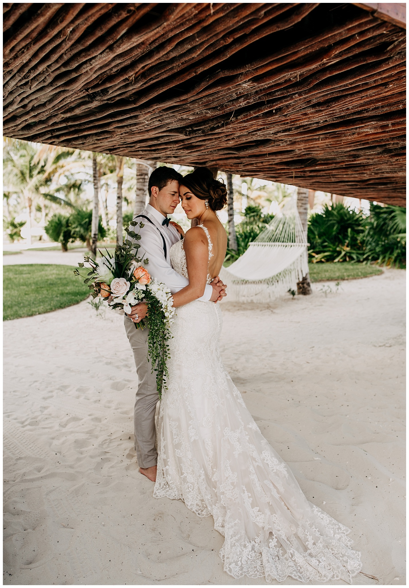 bride and groom portrait at cancun mexico wedding
