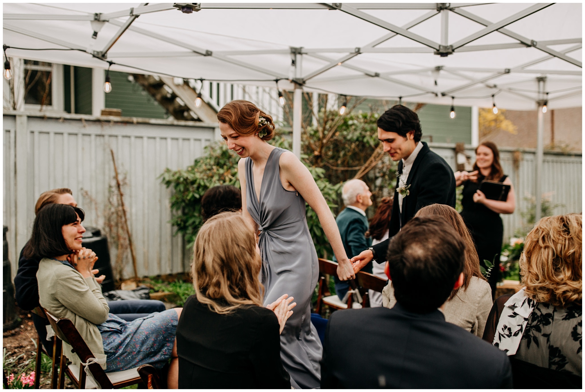bride and groom exiting ceremony at vancouver backyard elopement