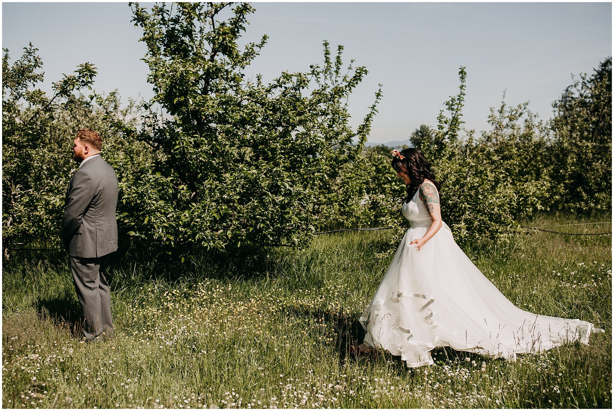 bride and groom first look at sea cider farm and ciderhouse wedding