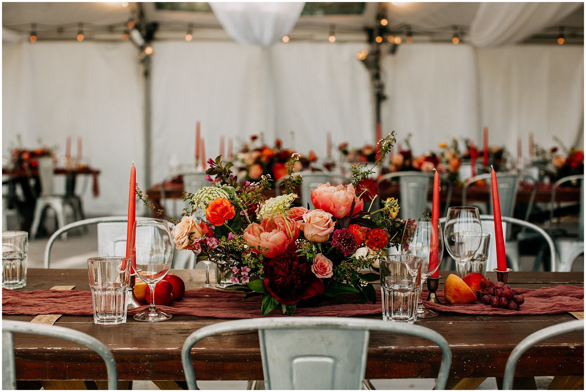 long table floral arrangements decor at sea cider farm and ciderhouse wedding
