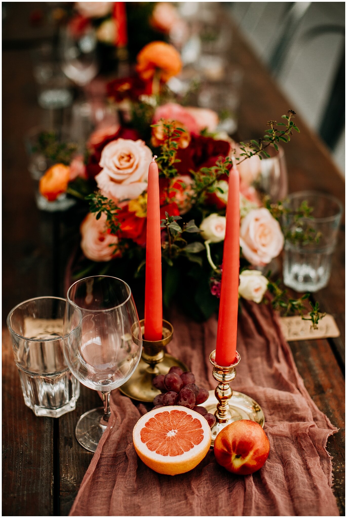 long table decor with fresh fruit and flowers at sea cider farm and ciderhouse