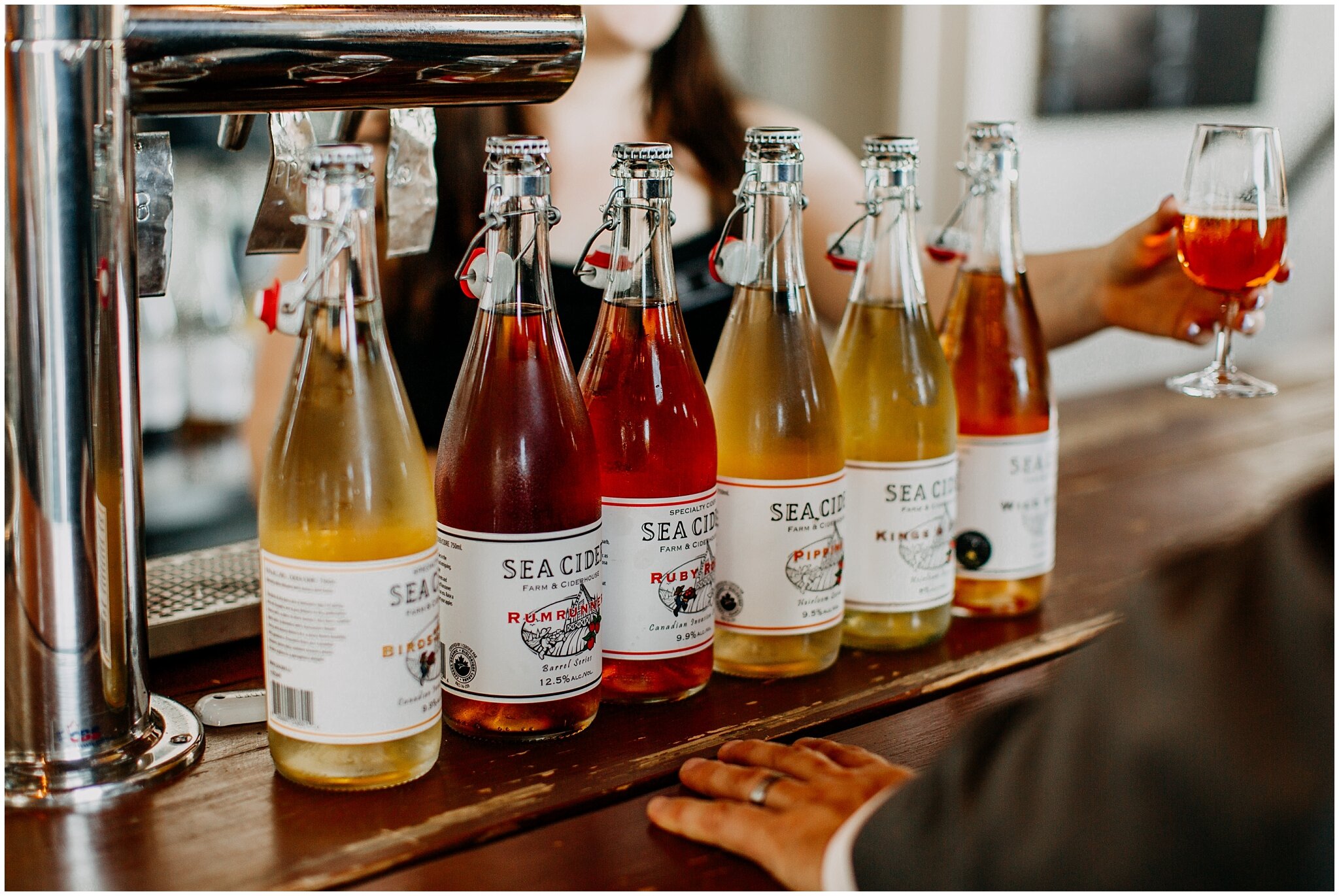 bottles of cider from sea cider farm and ciderhouse