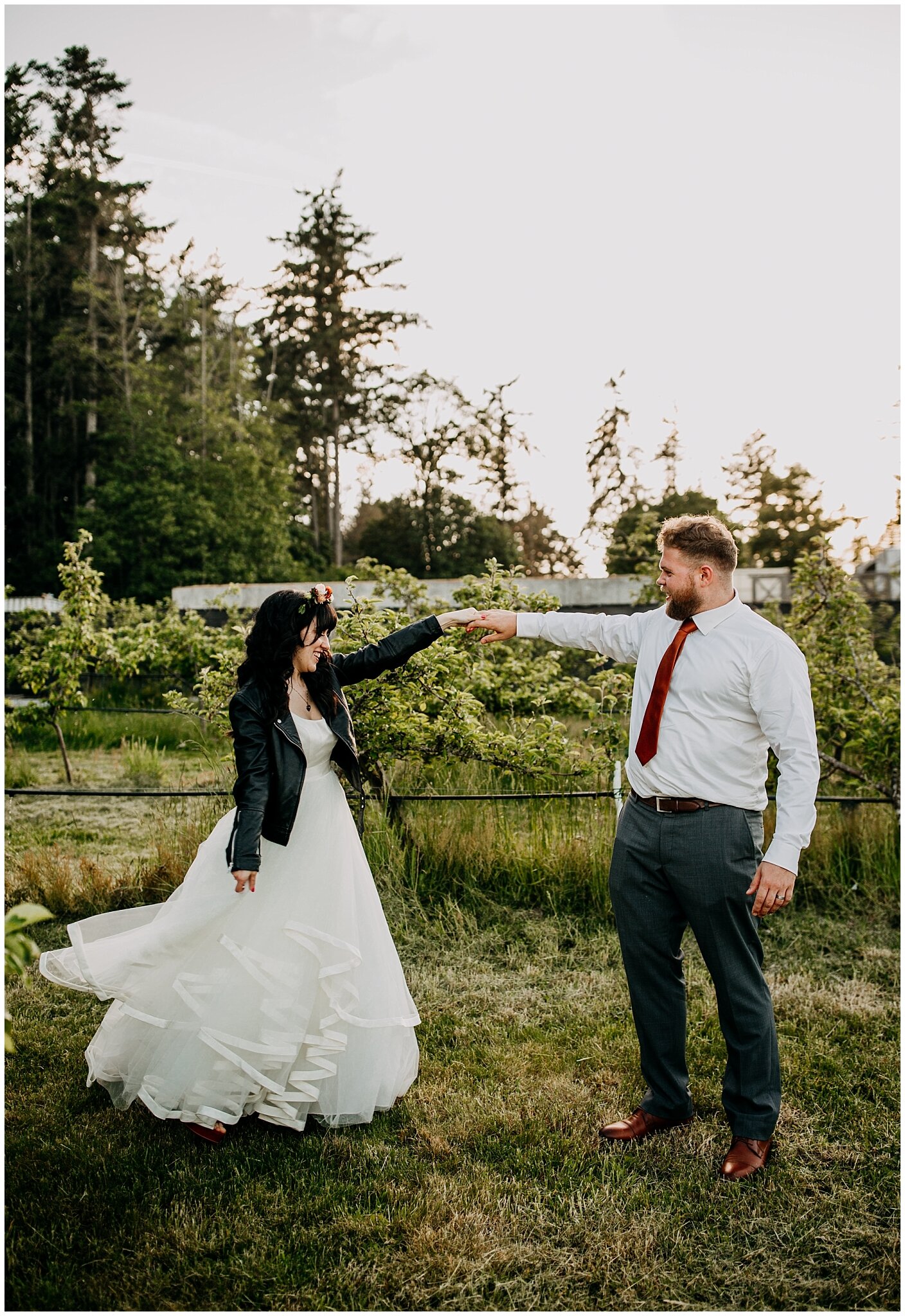 bride and groom dancing in vineyard at sea cider farm and ciderhouse