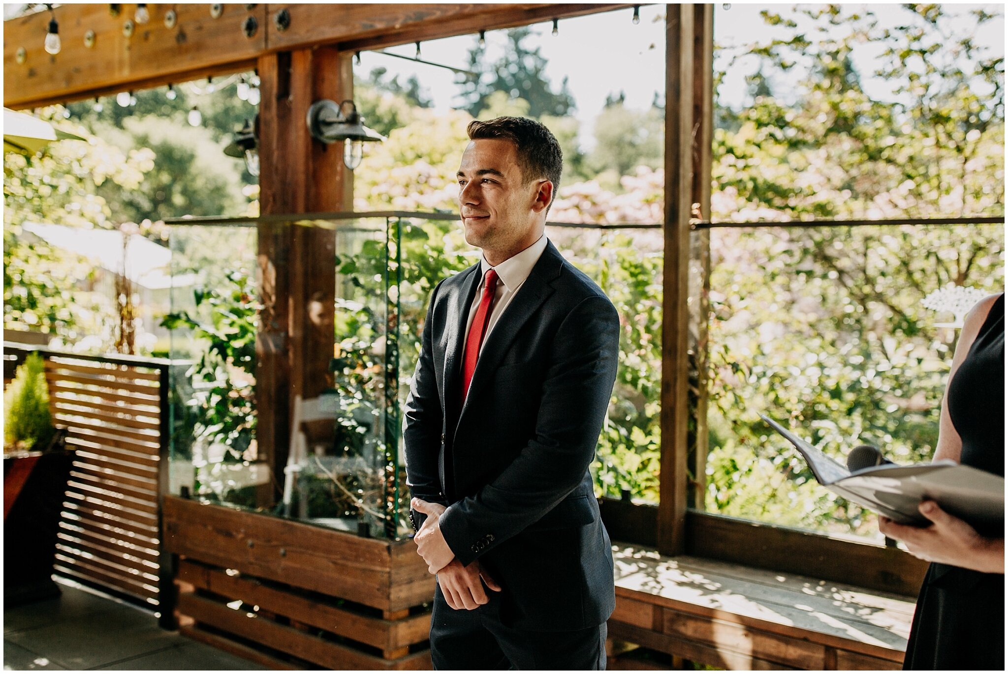 groom's reaction to bride walking down the aisle at shaughnessy restaurant wedding