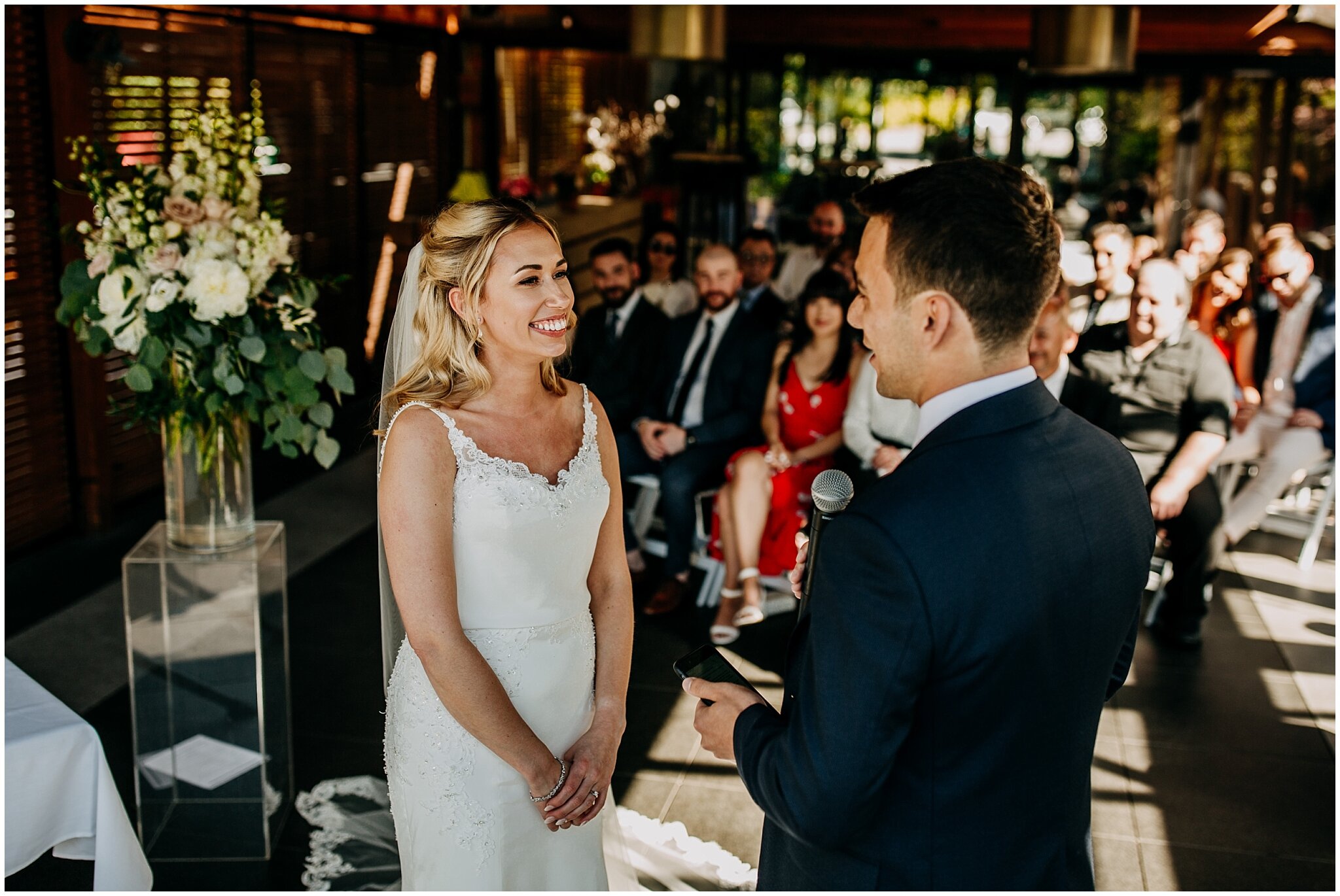 bride's reaction to groom's vows at shaughnessy restaurant wedding