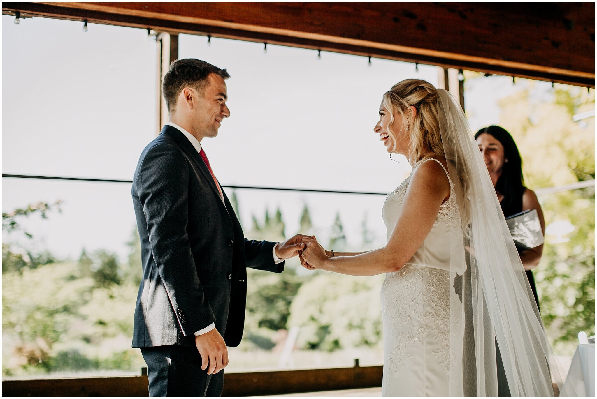 bride and groom exchanging rings at shaughnessy restaurant wedding