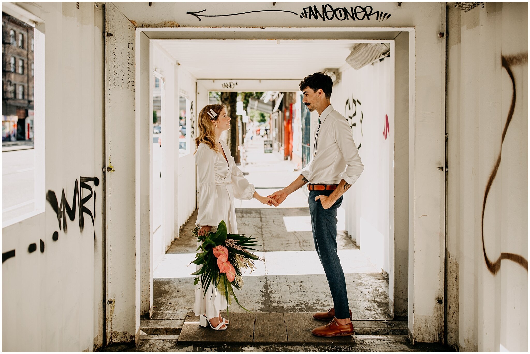 bride and groom urban portrait in vancouver