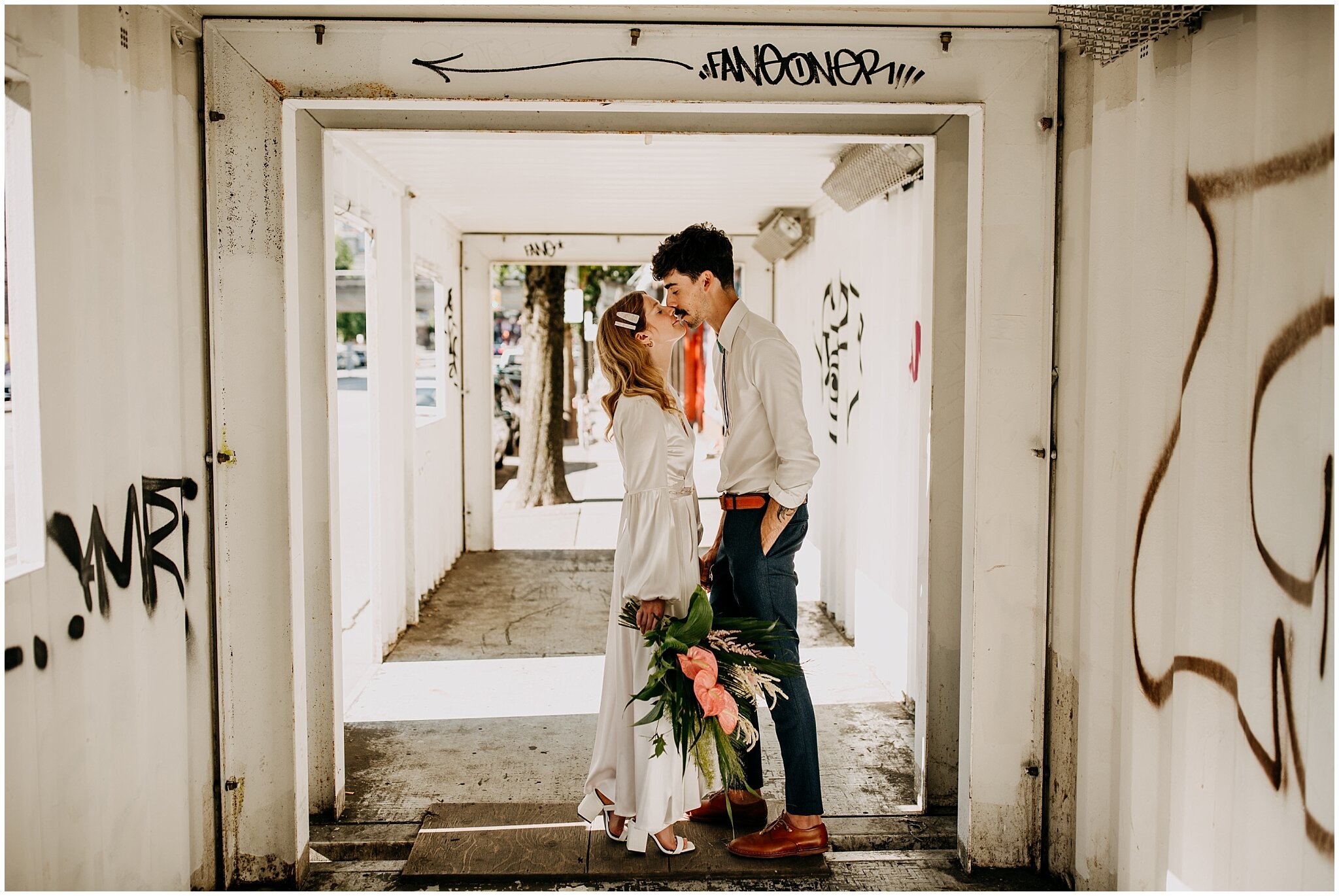 bride and groom urban portrait in vancouver