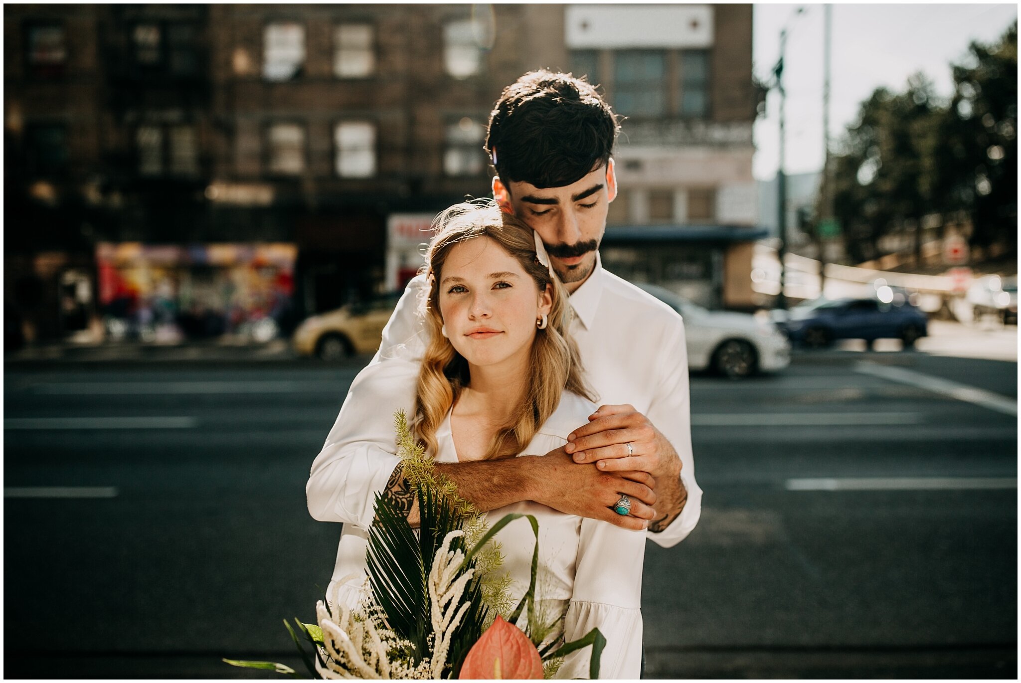 bride and groom portrait in the city at ellis building wedding