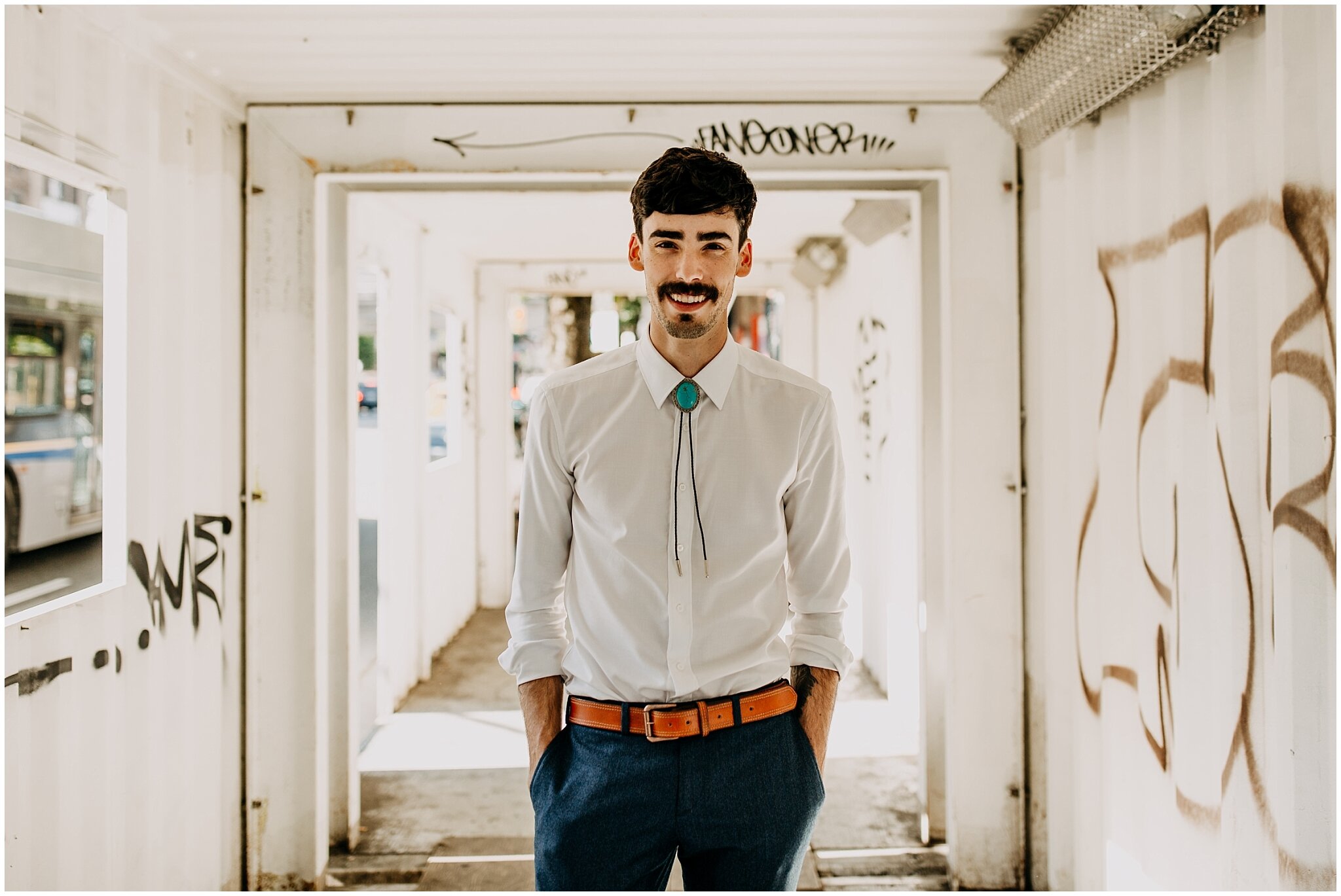 groom urban portrait in vancouver at ellis building wedding