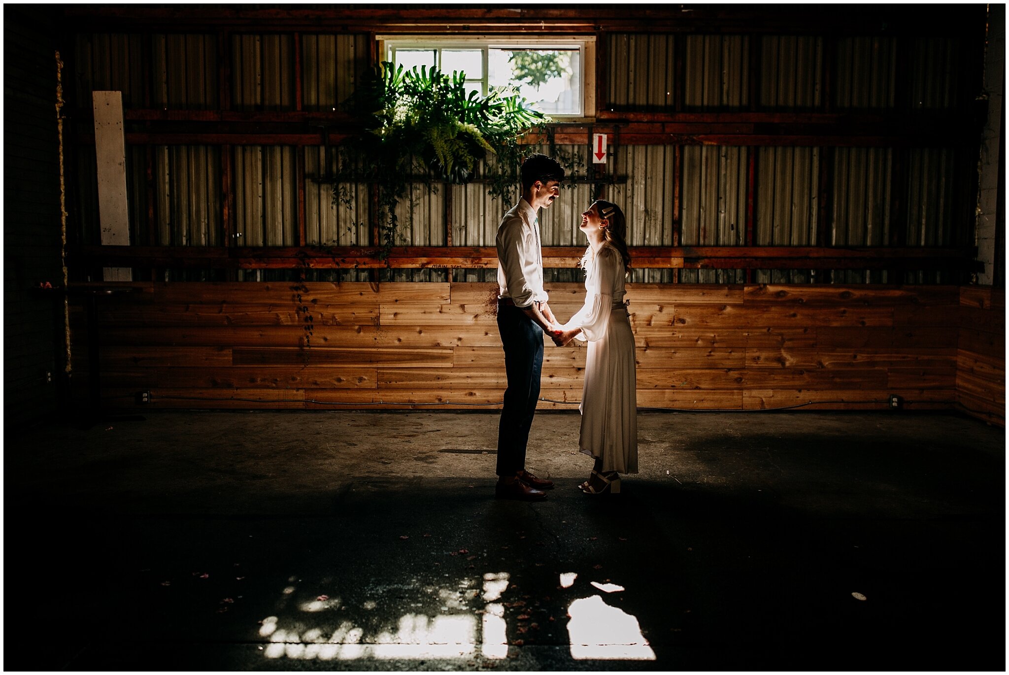 bride and groom creative portrait inside ellis building