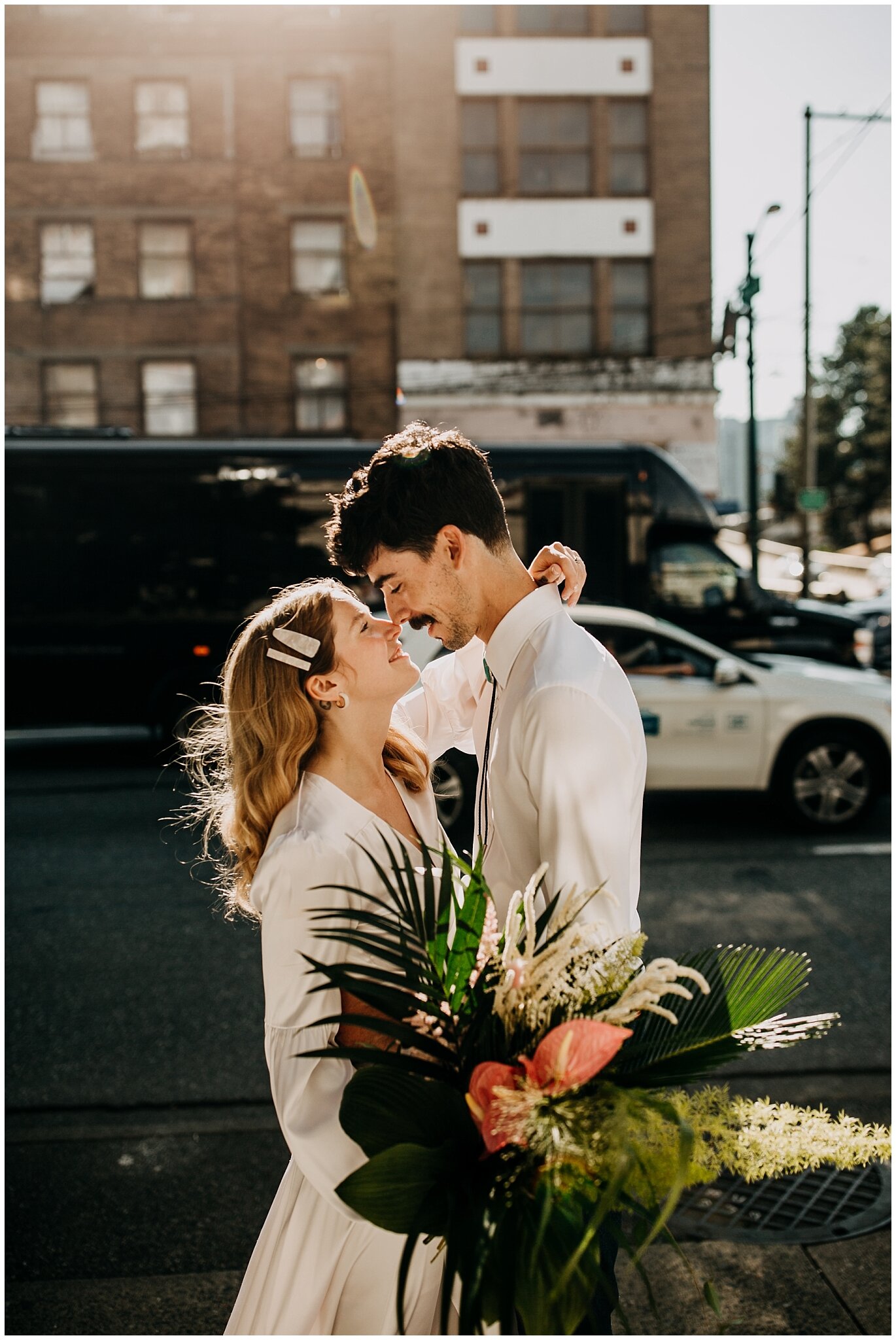 bride and groom portrait in the city at ellis building wedding