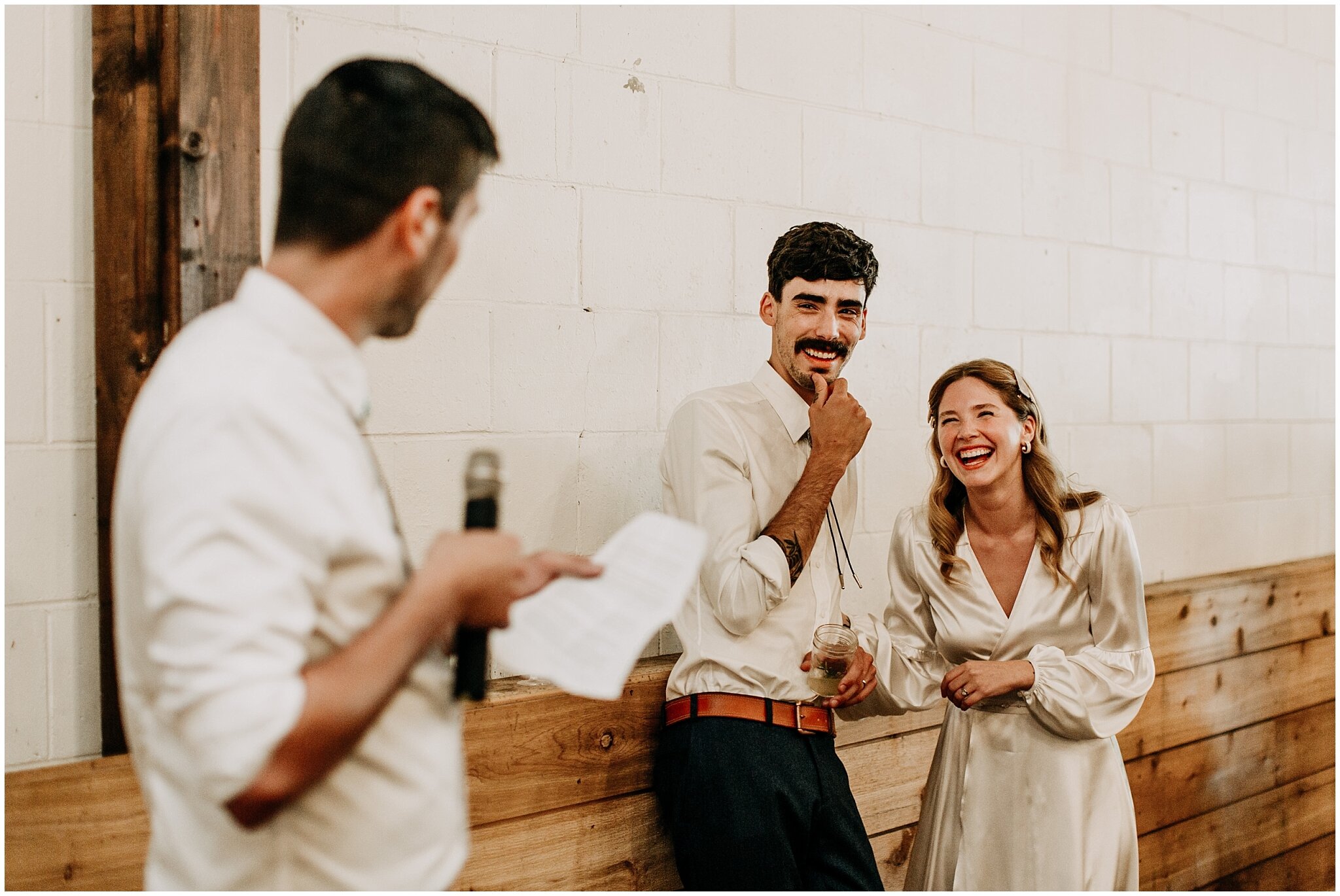 bride and groom speech reaction at ellis building wedding reception