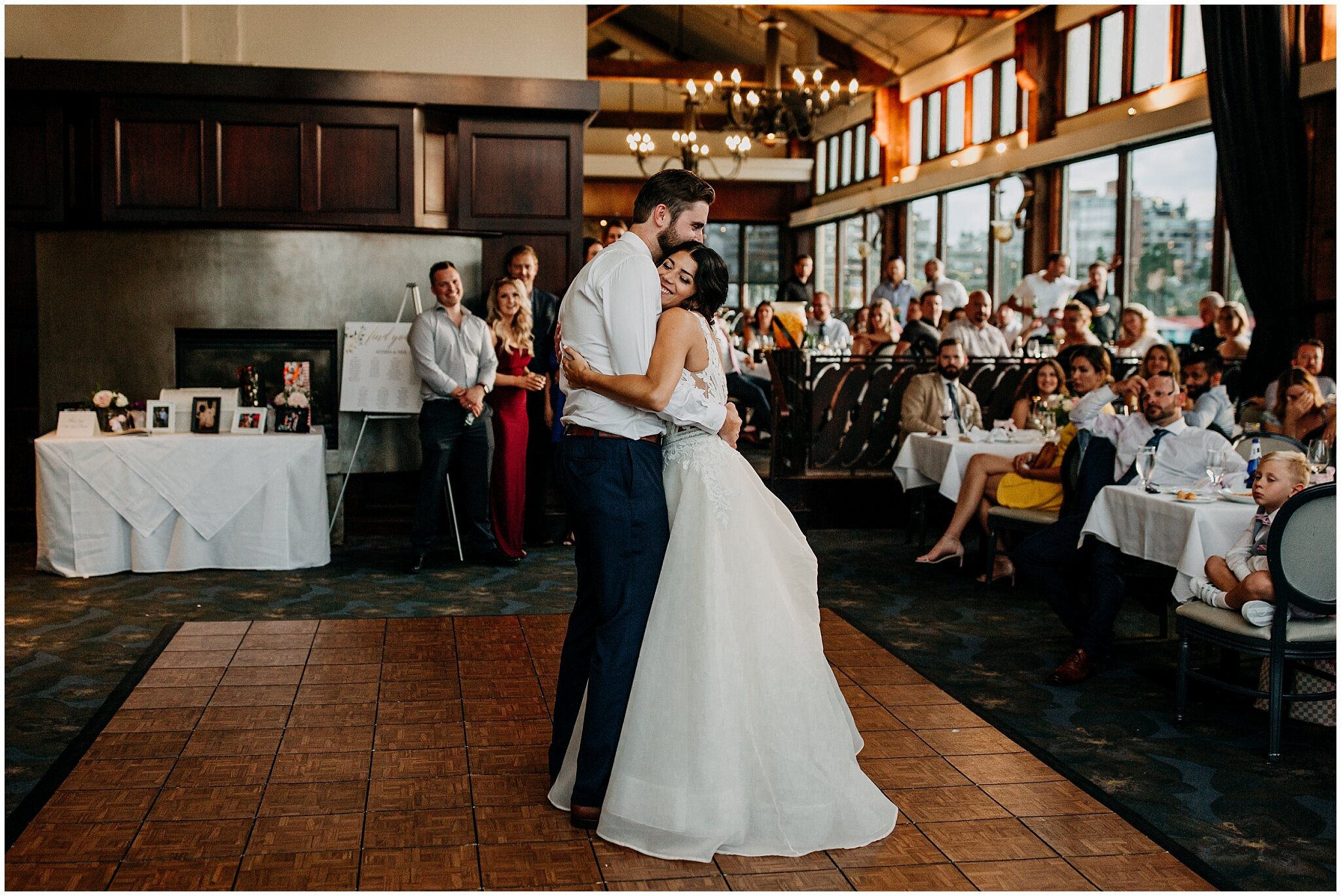 bride and groom sweet moment during first dance at bridges restaurant wedding