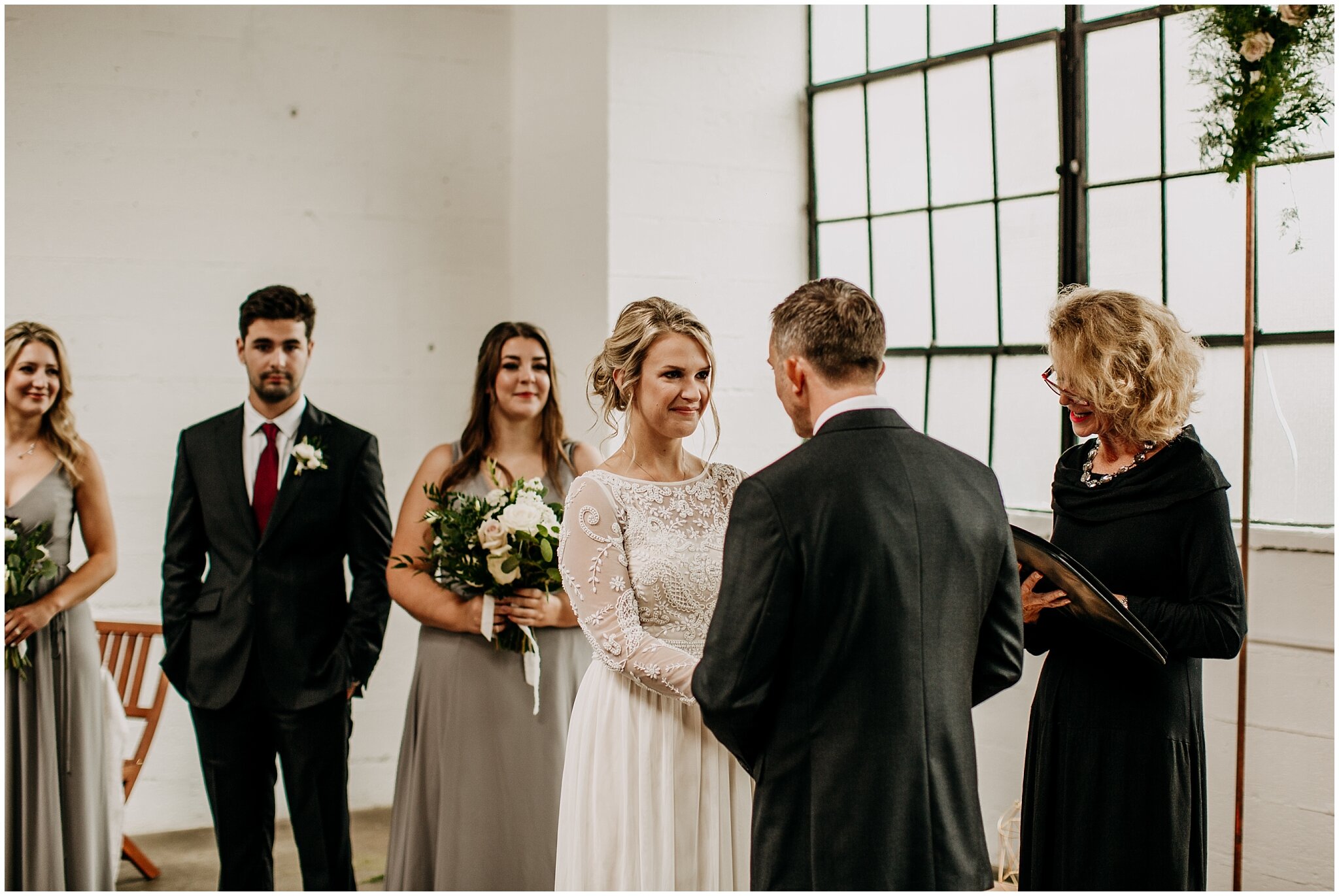 bride's candid reaction at settlement building wedding