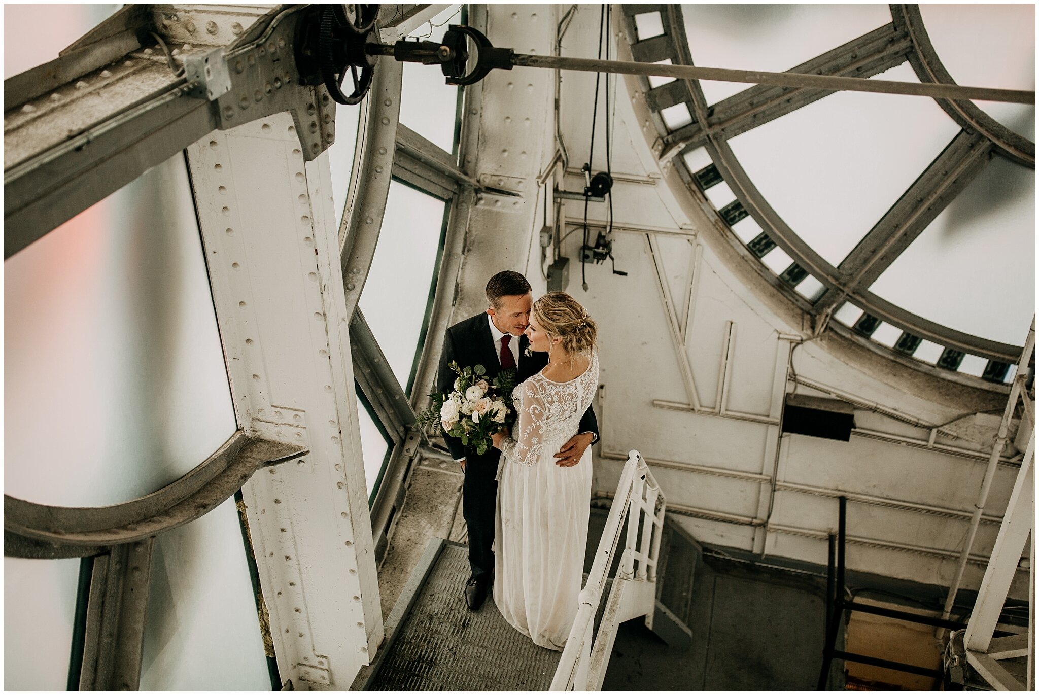 wedding couple portrait inside clock tower at vancouver block