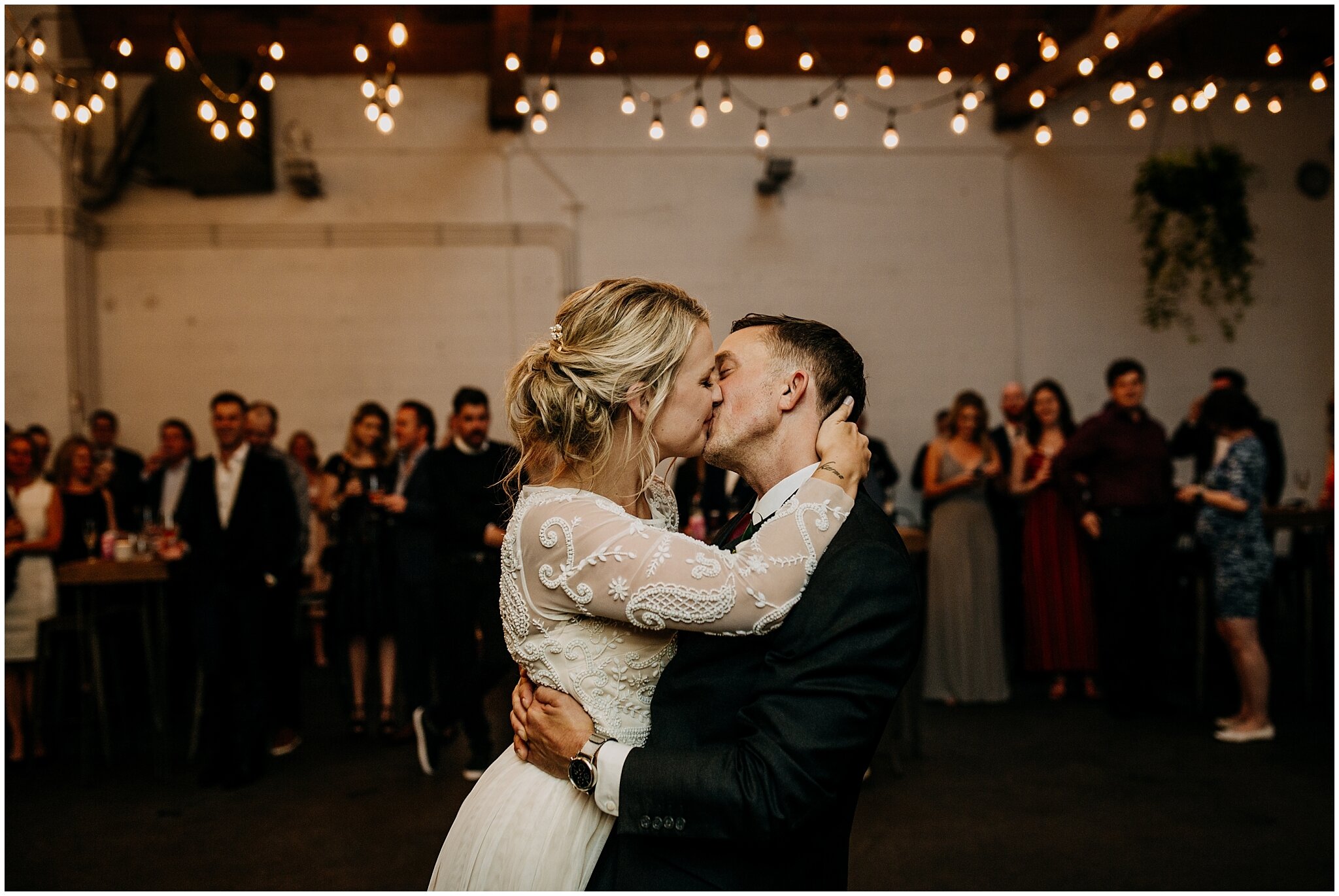 bride and groom first dance at settlement building wedding