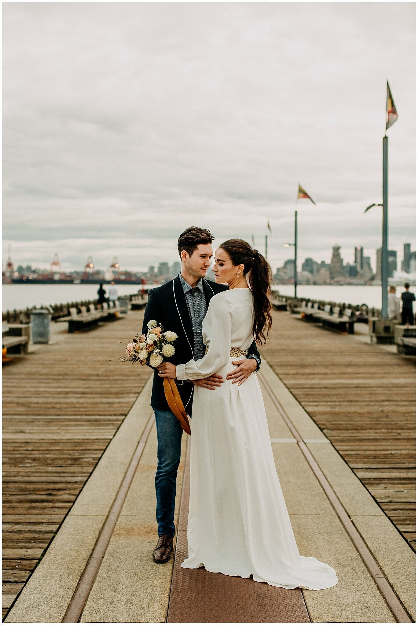 bride and groom portrait on lonsdale quay for rocky mountain bride styled shoot