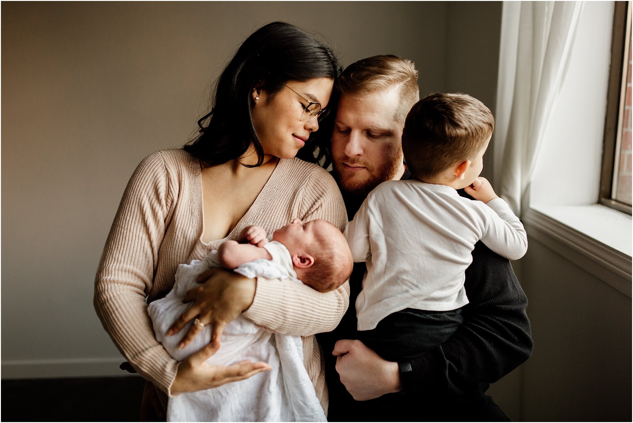 natural light studio portrait of family of four in vancouver