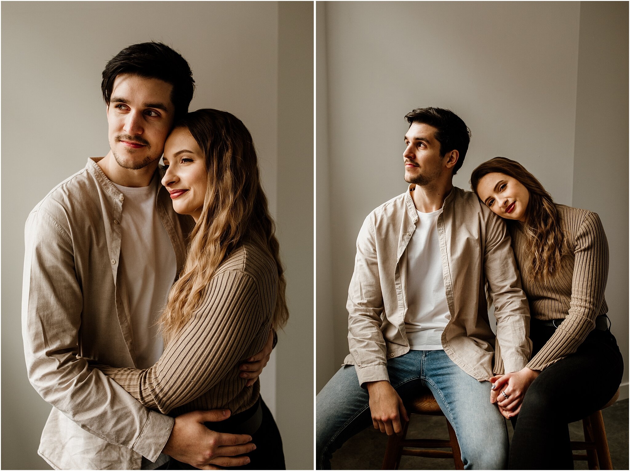 natural light studio portrait of couple sitting on stools in front of white wall
