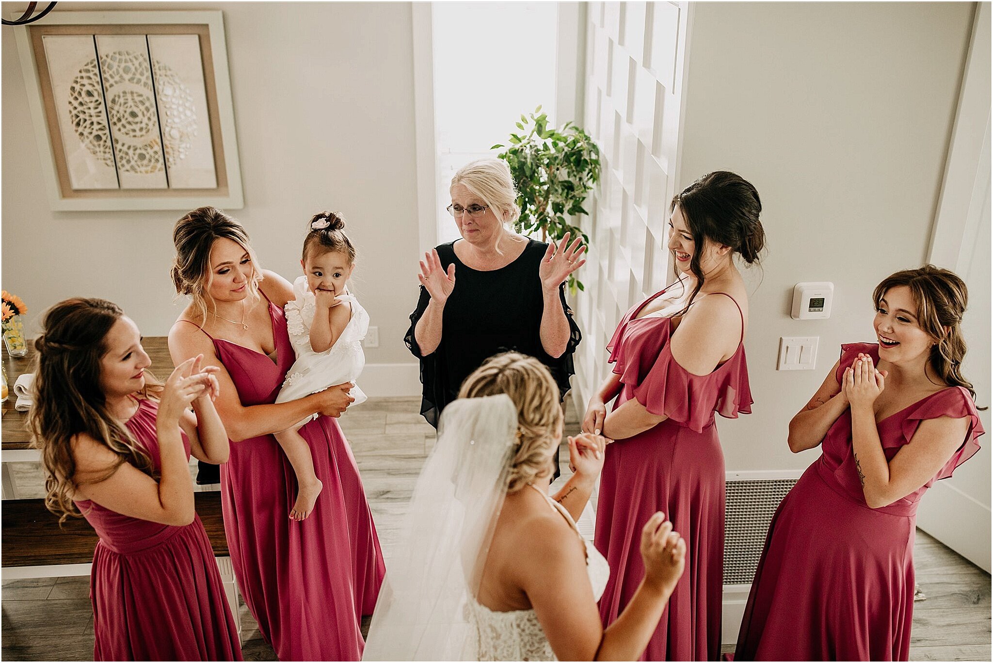 bridesmaids reacting to wedding dress in small intimate wedding Surrey BC