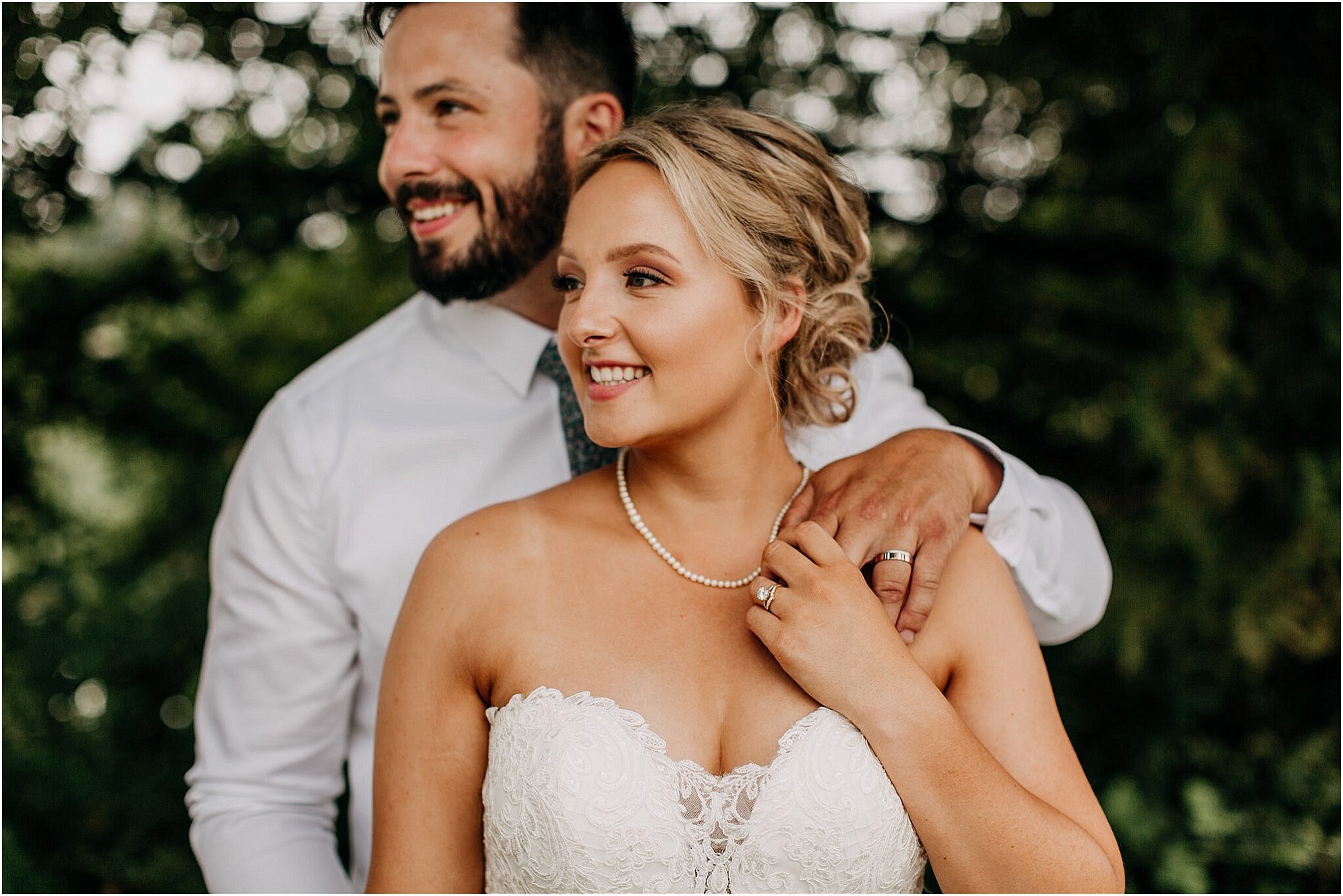 bride and groom with wedding rings in Surrey BC