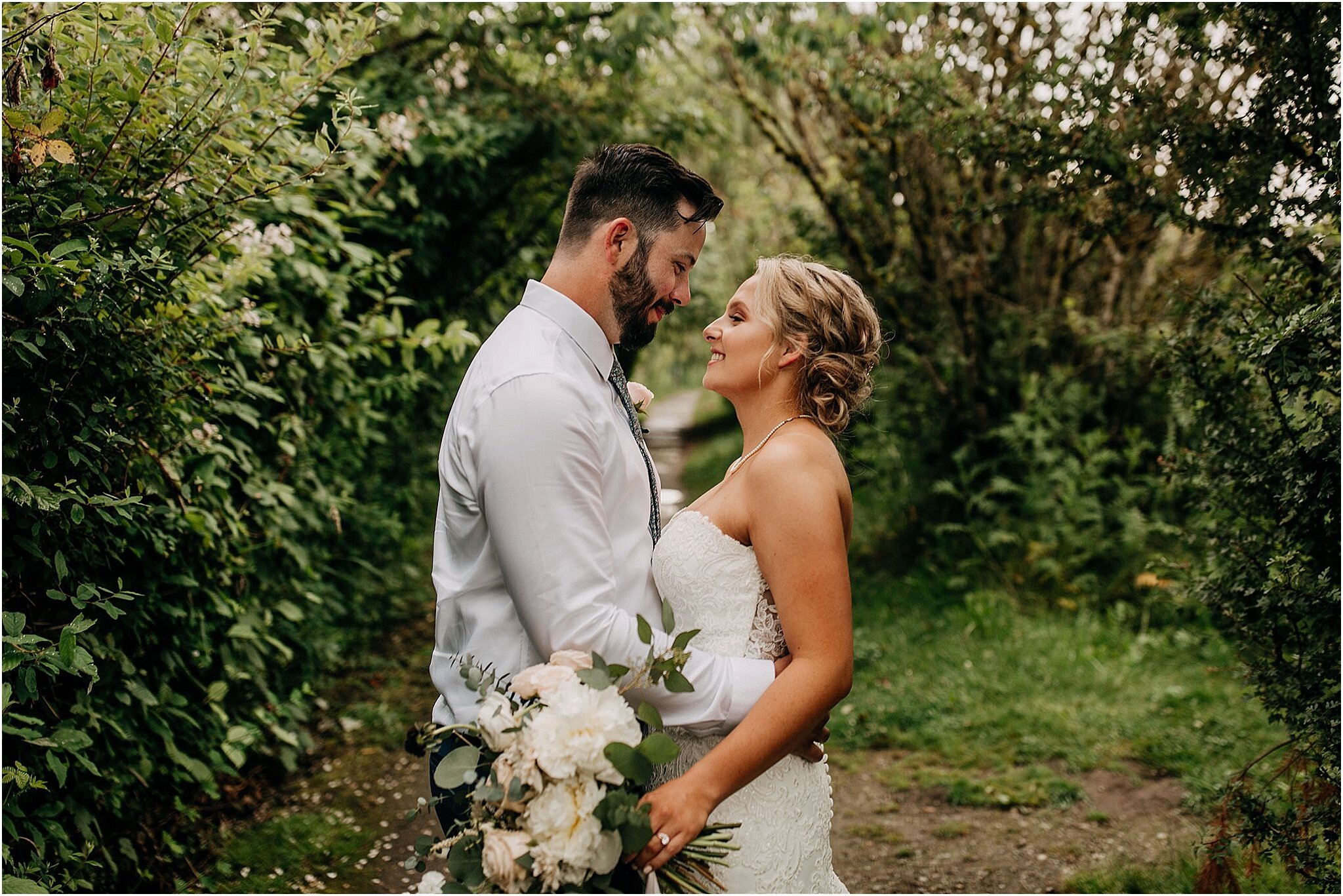 bride and groom portrait embracing Surrey BC