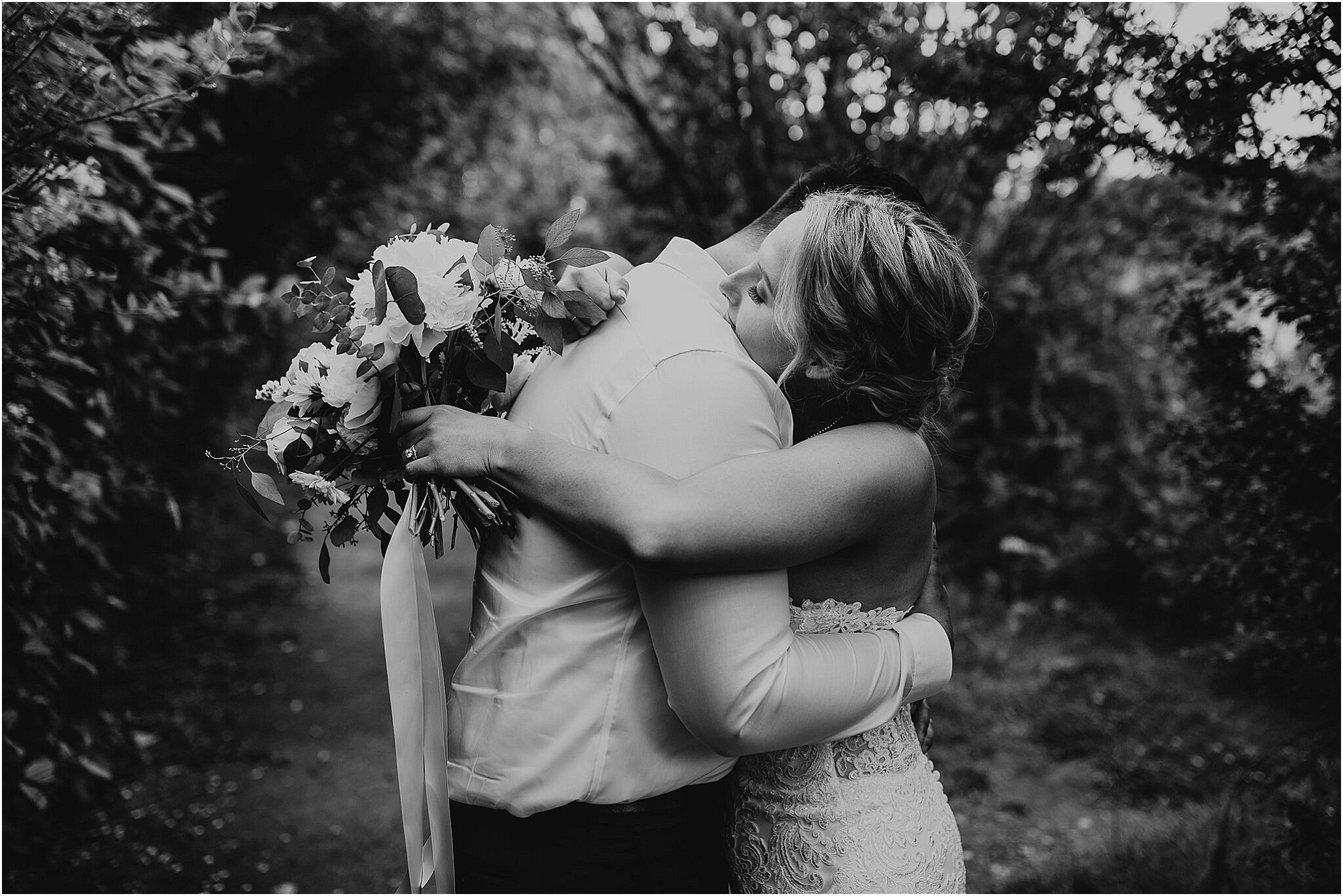 bride and groom emotional hug in Surrey BC