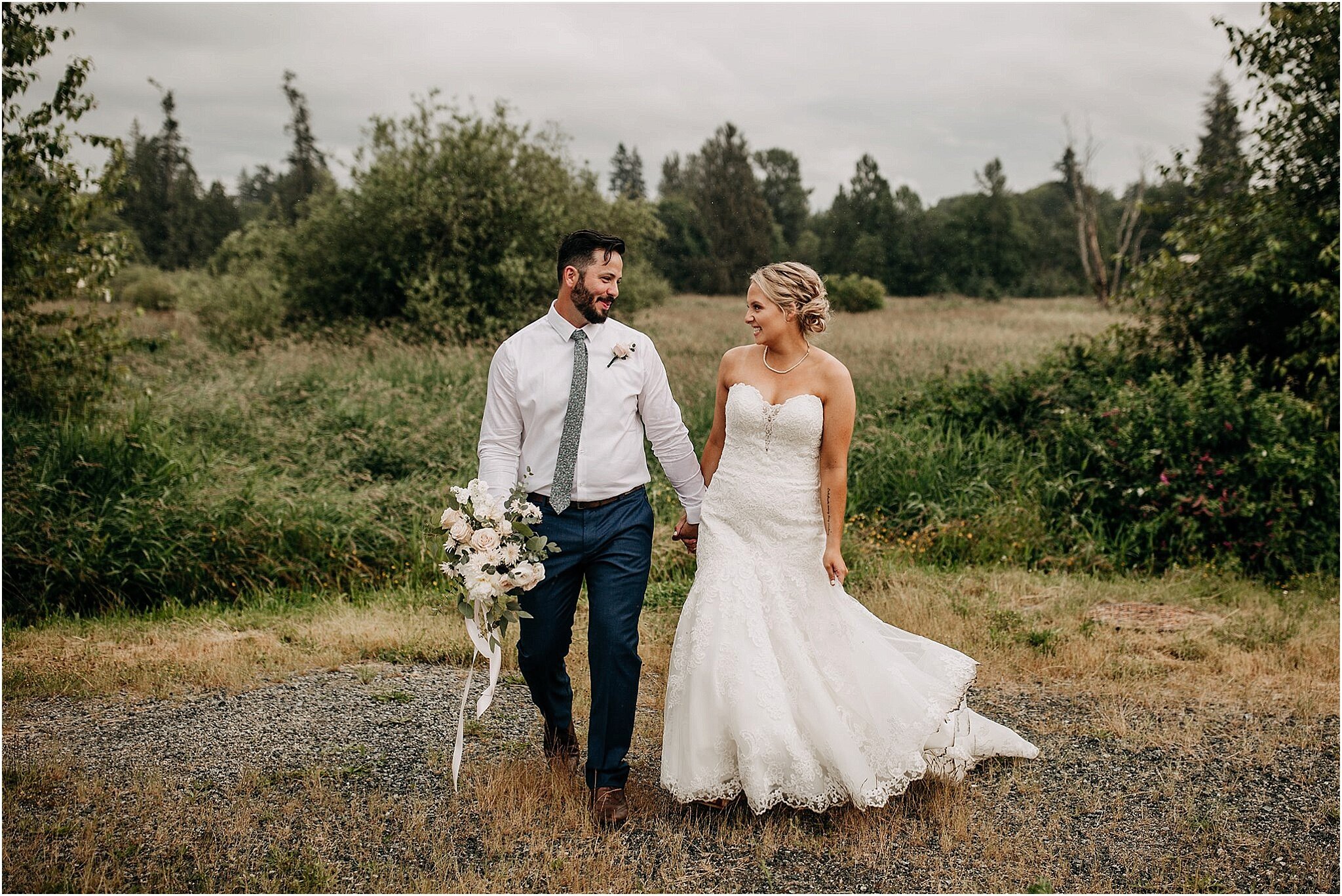 bride and groom walking and holding hands in Surrey BC wedding portrait