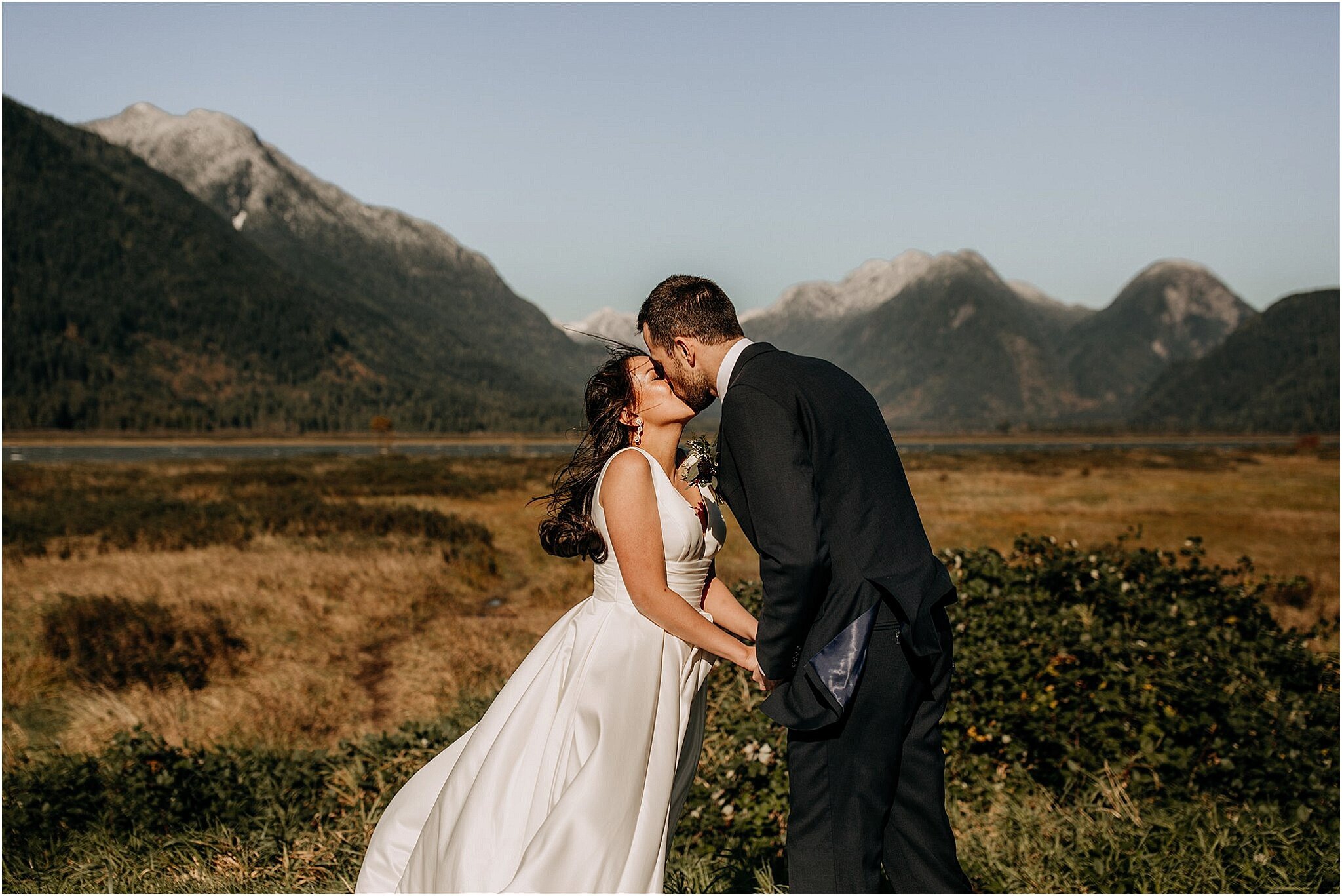 pitt lake elopement bride and groom first kiss